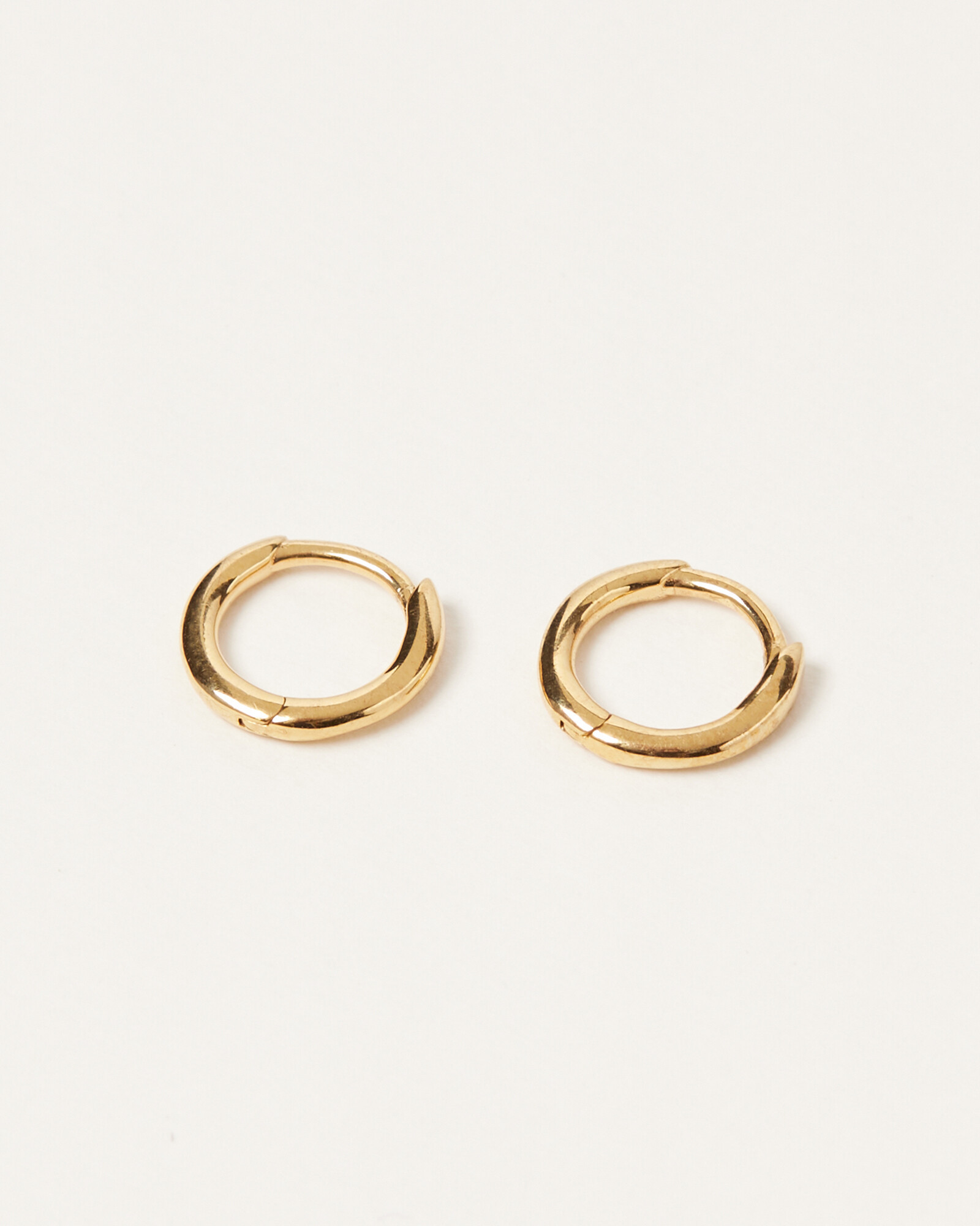 Juniper Mini Gold Plated Huggie Earrings | Oliver Bonas | Oliver Bonas (Global)