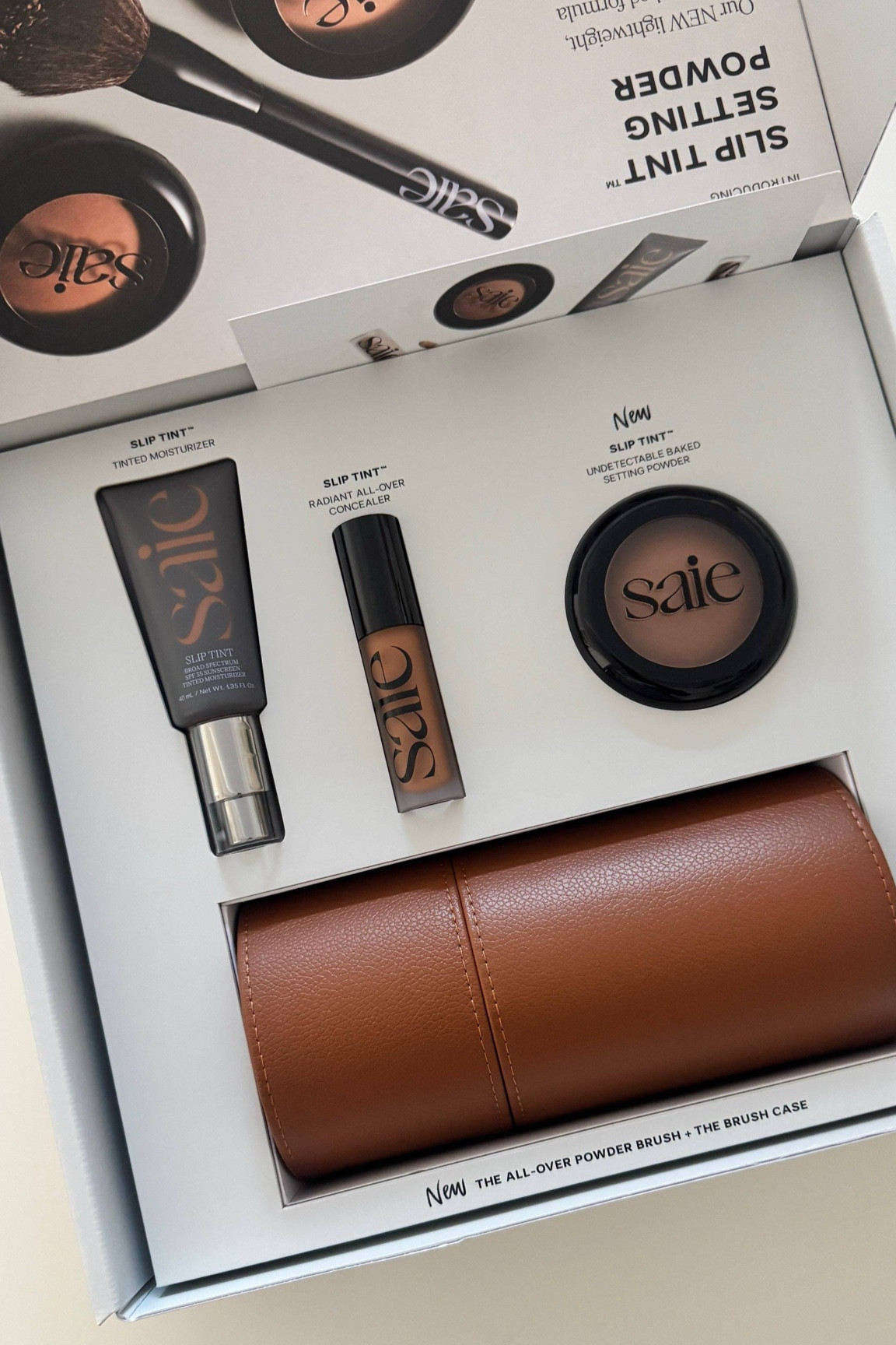 Some of the best makeup base products money can buy! I absolutely love these products from Saie. The slip tint foundation and concealer are so good and create such a flawless complexion. Now they have a  baked setting powder! … For more links to elevated basics clothing, georgia louise1, wedding guest dress, kathleen post, fall purse, jeans, fall outfits, follow me on LTK! ✨

#LTKBeauty #LTKSeasonal #LTKFindsUnder100