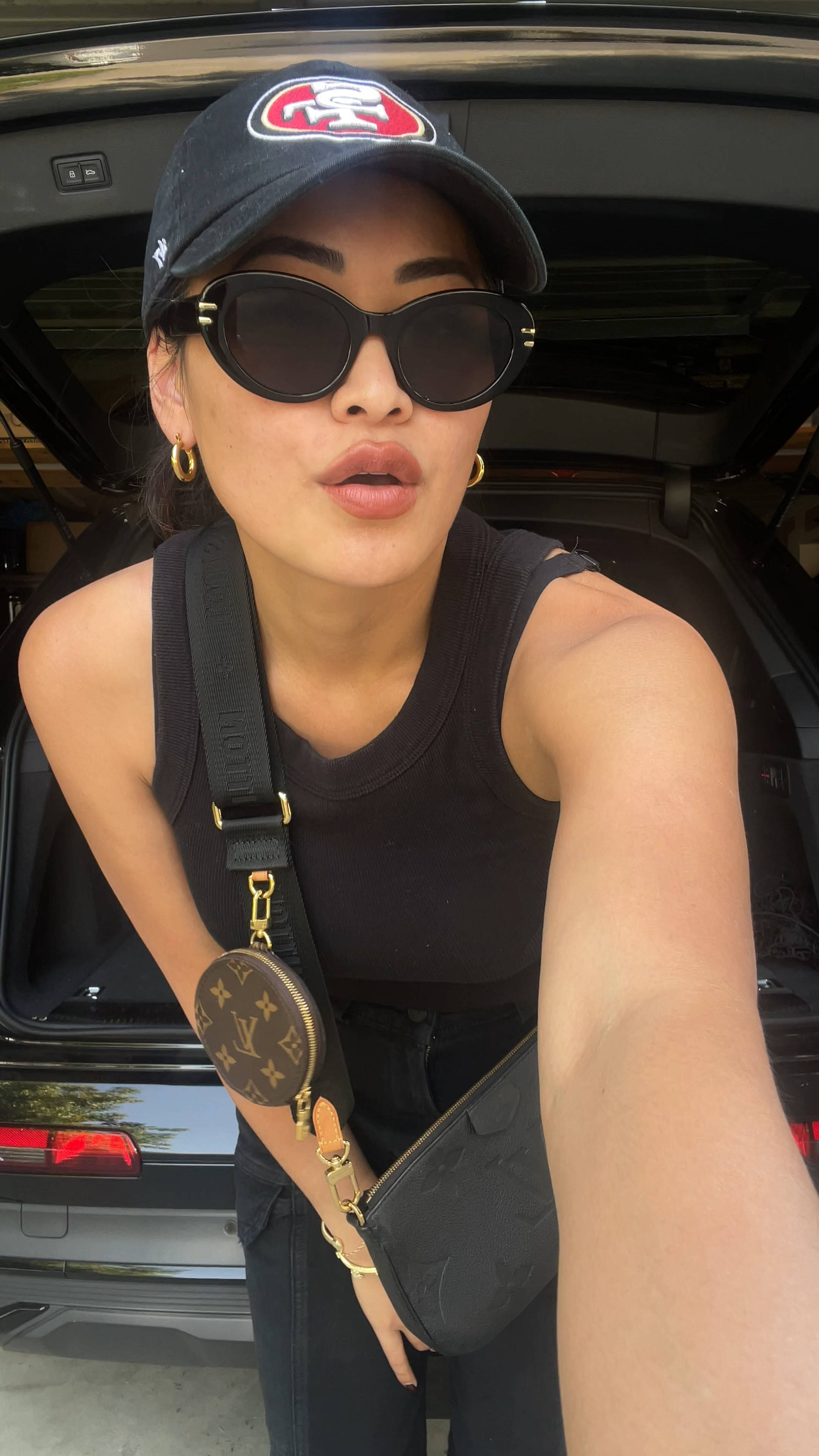 it’s football season!!! What team are you repping? Let’s go 49ers!!!!!!! Basic essentials - 49ers cap, ribbed tank top and all the gold bracelet accessories ! Lipstick shade is SAHARA 310