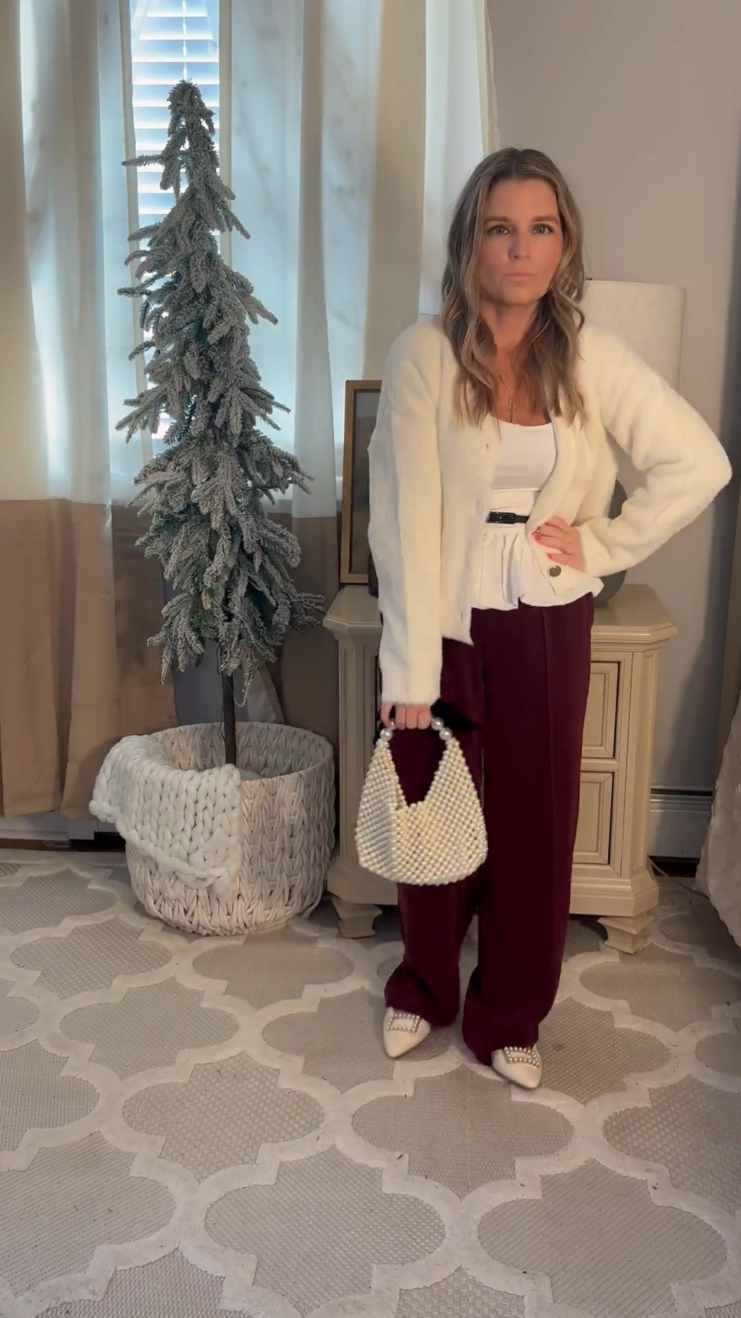 Love how cute this winter outfit is! Peplum top, burgundy work pants that are comfortable! Pearl bag! 

#LTKFindsUnder50 #LTKSeasonal #LTKHoliday