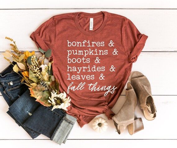 Read the full title
    Fall Saying Shirt - Bonfires Pumpkins Boots Hayrides Leaves Fall Things S... | Etsy (US)