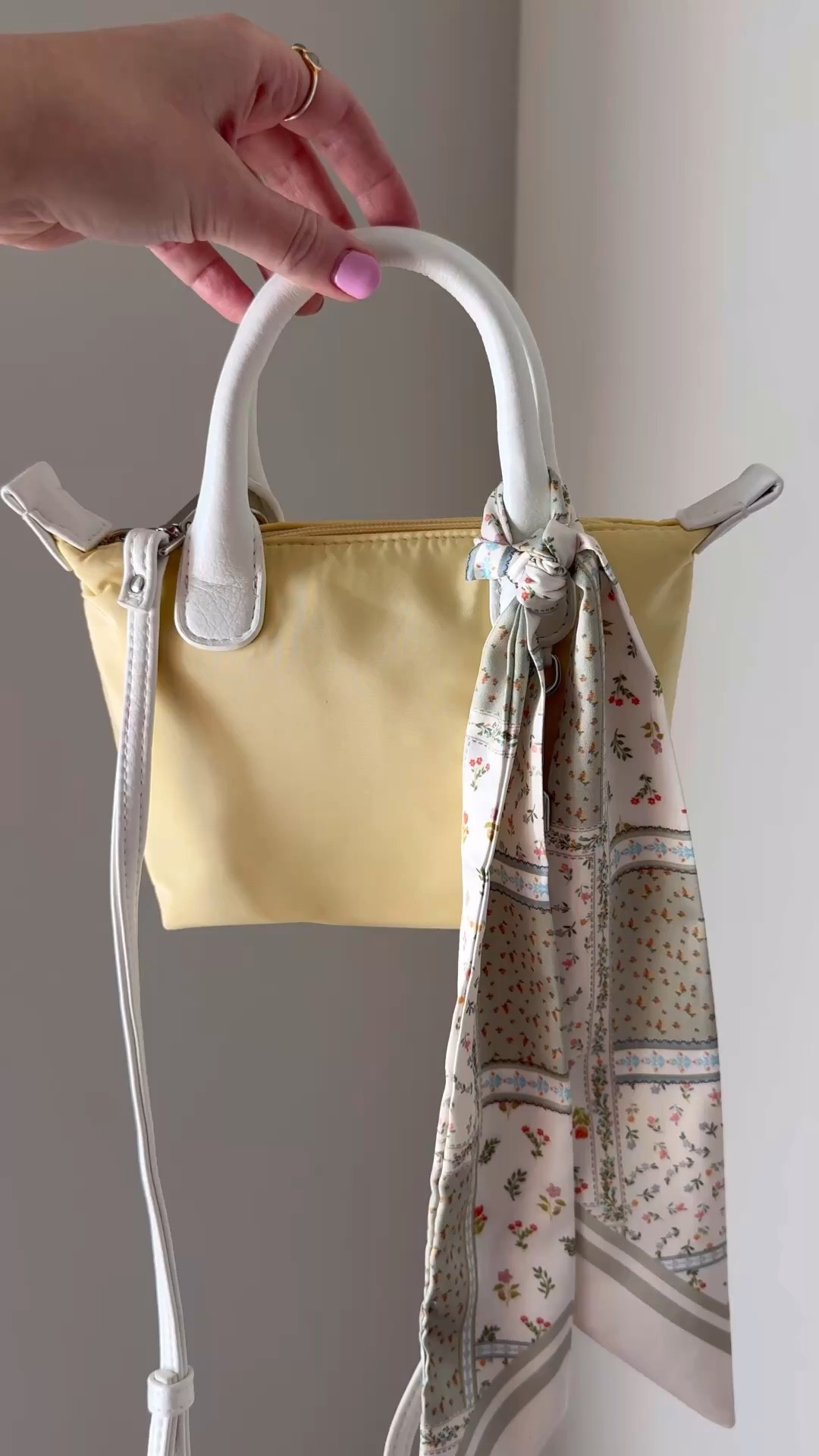 The CUTEST little mini bag and scarf! Big enough to hold my iPhone pro, lipgloss sunglasses and card holder and under $20!

Mini bag, yellow bag, Walmart find, summer style, bag scarf 