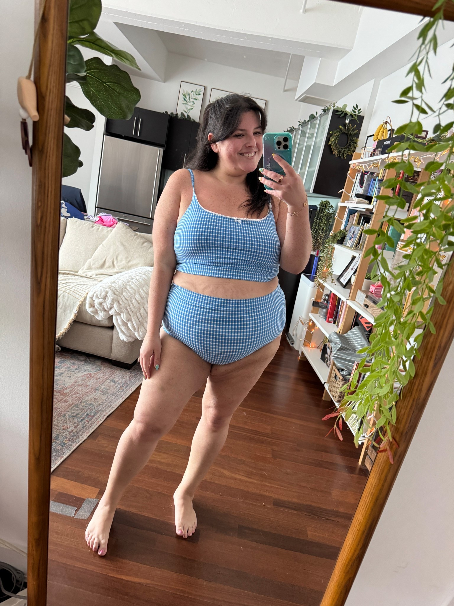 Loving this swimsuit so much! The blue gingham is cute and classic. I’m wearing a XXXL in the top (I ordered XXL but they sent the wrong size) and XXL in the bottom. It def runs small so you should size up! It’s not stretchy. I am exchanging the bottoms for XXXL and then I’ll be fine. You can use code ARIELLE20 for 20% off!! 

#LTKSaleAlert #LTKSwim #LTKPlusSize