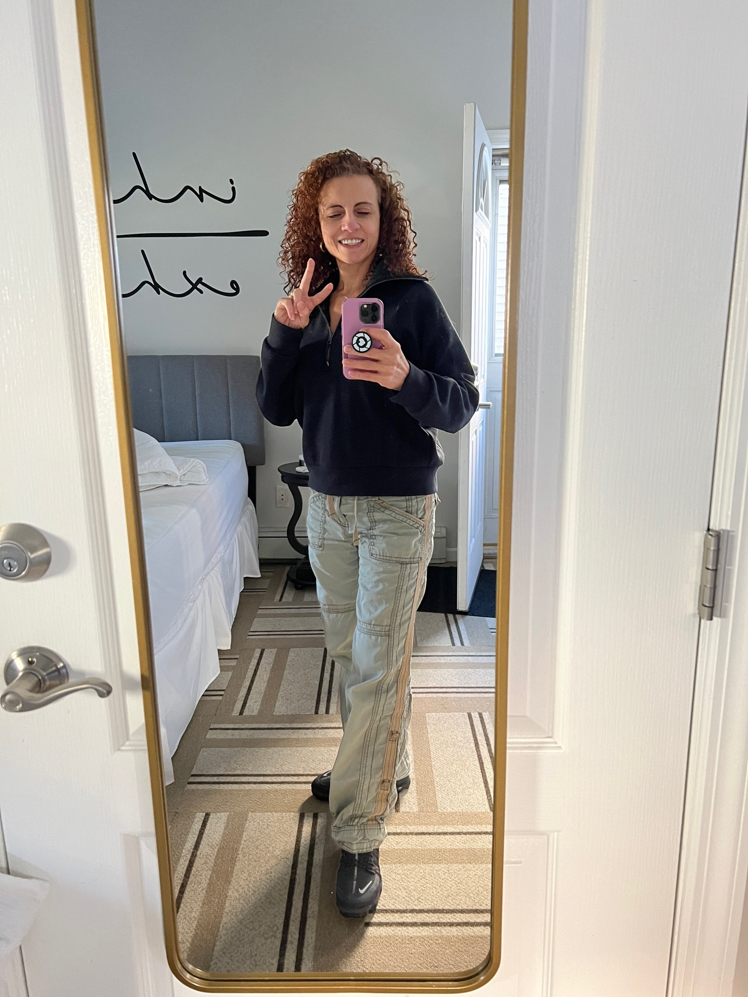 Fall fashion casual Friday work from home. Black pullover half zip, flutter sleeve top with olive parachute pants and good vibes black sneakers! Happy Friday!!

#LTKActive #LTKStyleTip #LTKOver40