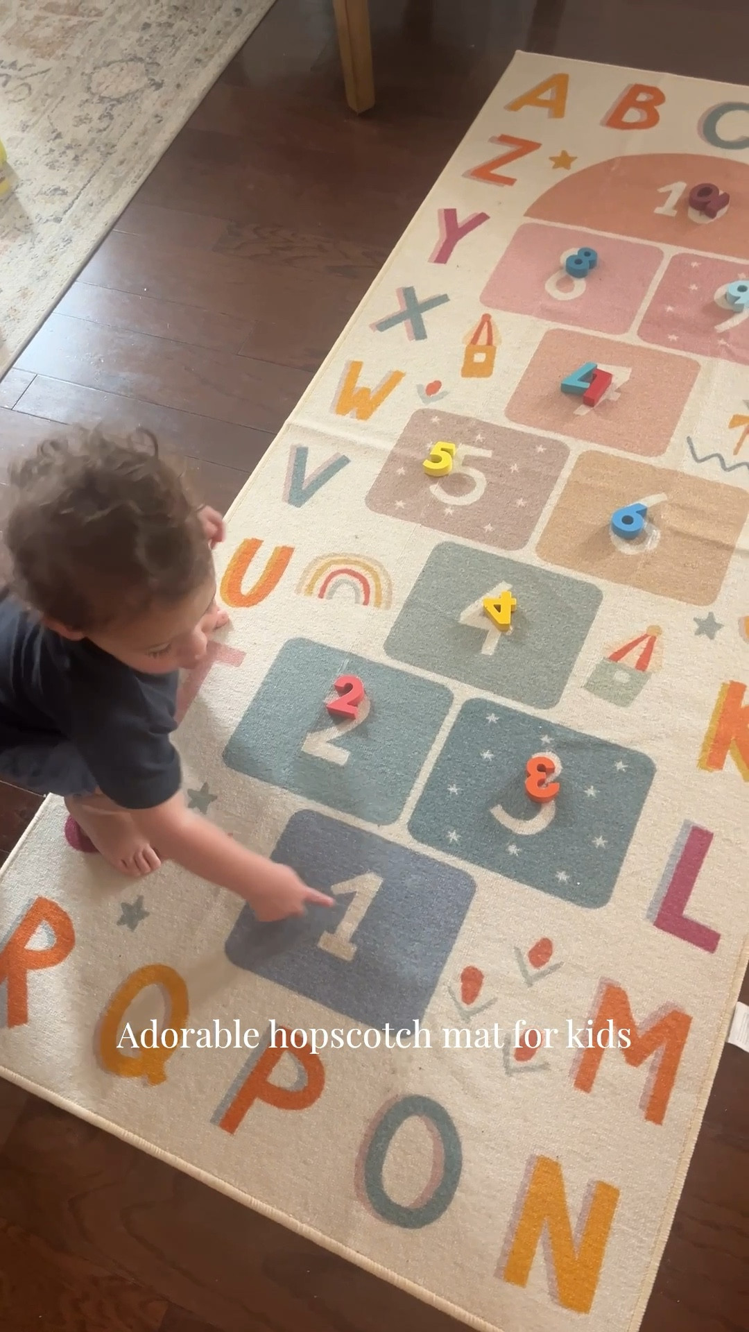 Adorable hopscotch mat for kids💛 my son is 2 and is starting to become interested in numbers. He was matching puzzle pieces with the hopscotch numbers

#LTKKids #LTKFamily #LTKHome
