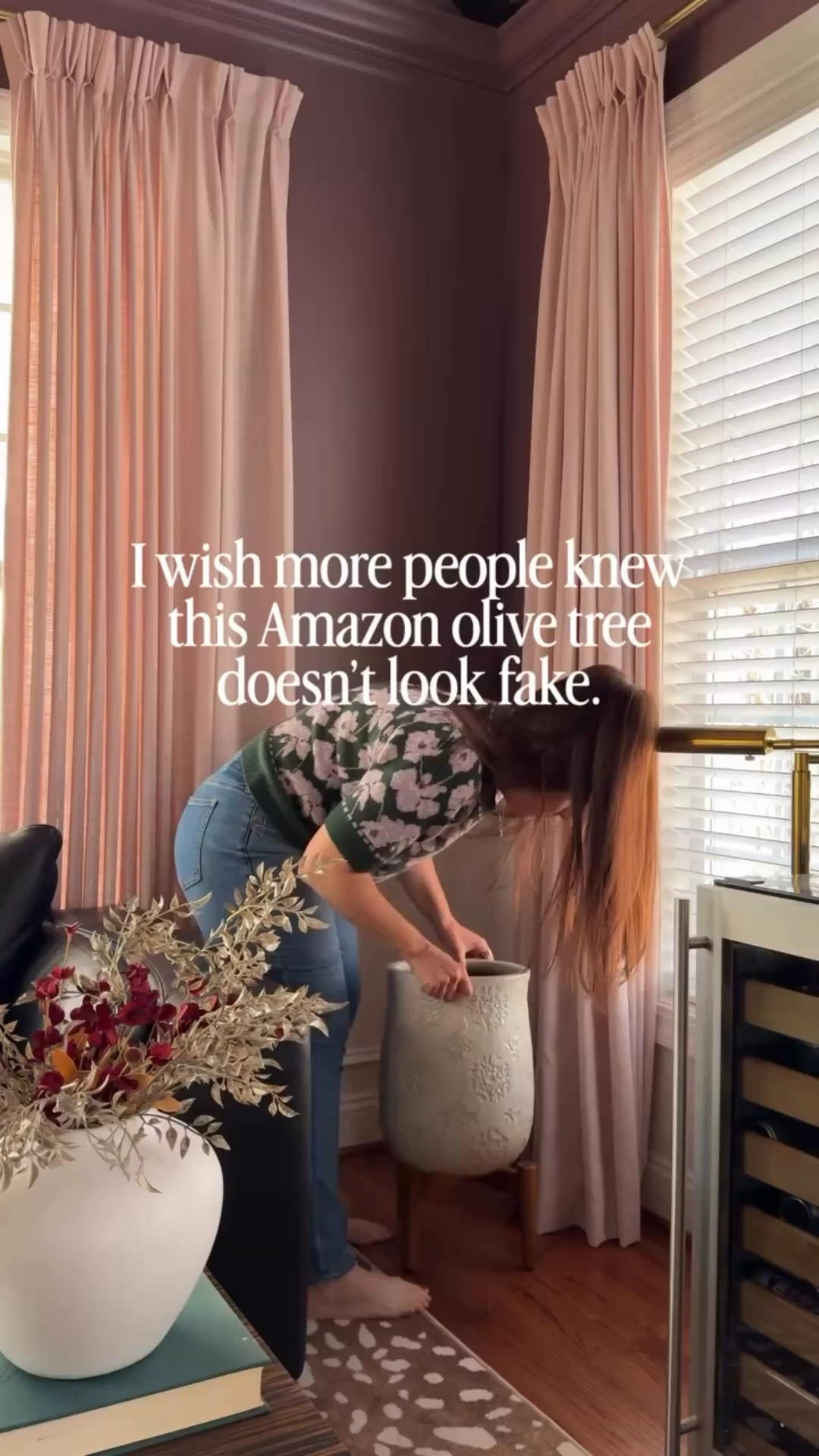 You know how most faux olive trees look a little… questionable?
This one actually surprised me.

The trunk has real texture, the branches have movement, and the olives and leaves don’t have that shiny plastic look that gives most faux plants away.

Our lounge doesn’t get enough sunlight for real plants to survive here, so this was the perfect way to add height and greenery without worrying about watering or plant care.

It’s 7 feet tall, easy to assemble, and one of the most realistic olive trees I’ve found at a great price point.

Designer tip: place it in a larger decorative planter and fluff the branches a bit and it instantly makes it look even more realistic.



⸻

Amazon home finds | faux olive tree | artificial olive tree | realistic faux plants | olive tree decor | designer Amazon finds | living room styling

#amazonhomefinds #amazondecor #fauxolivetree #homedecorfinds #rutledgecollective

#LTKdayinmylife #LTKHome #LTKstorytime