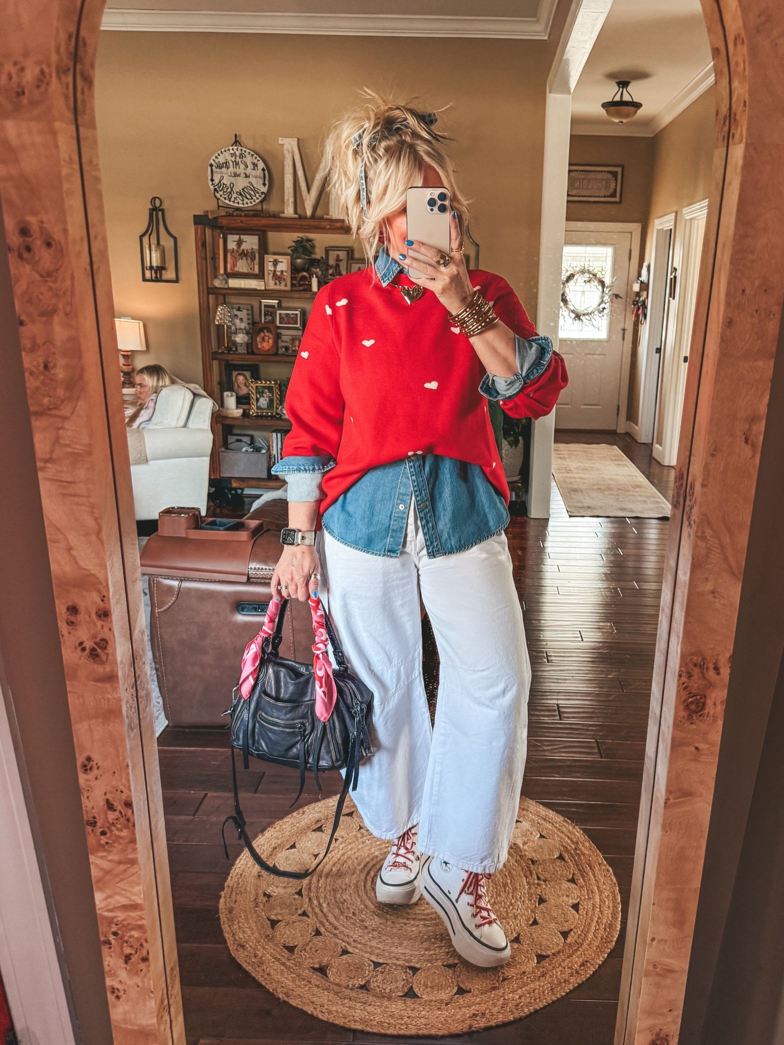 The cutest sweater and love to tuck my sweaters like this over button ups. 
Sweater M
Denim shirt M
Jeans true to size 
Converse sized down  #LTKValentine

#LTKOver40 #LTKootd