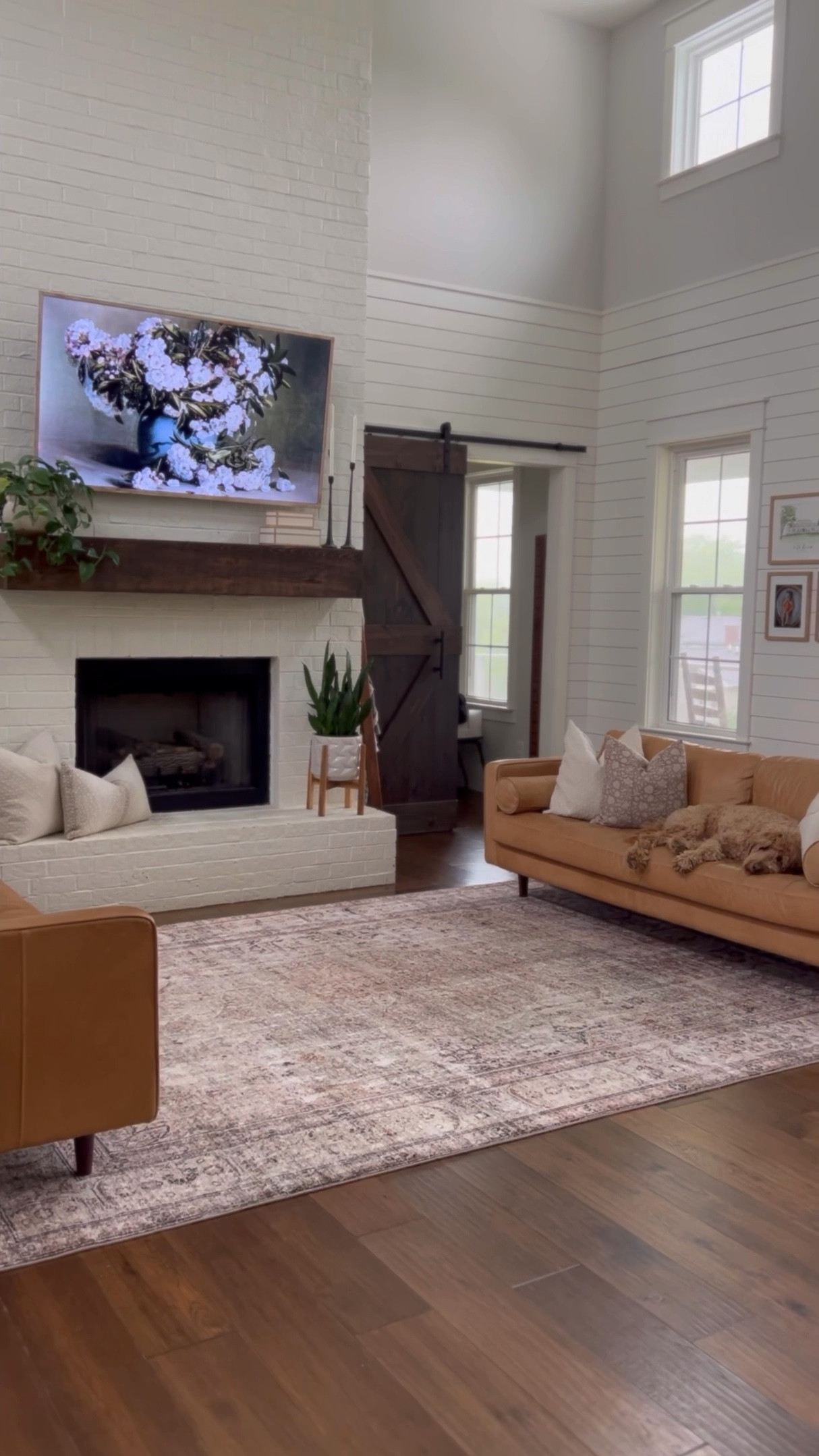 Living room refresh is easy with a new area rug! Obsessed with this one from Loloi - Margot Antique Sage cloud pile! So soft and cozy and the perfect colors! Also linking the previous rug which I still adore from ruggable - it’s washable! Leather couch sofa gallery wall picture frames black candlesticks Everett foyer entry table throw pillows covers nesting accent tables home decor finds trends accents and accessories 

#LTKhome #LTKstyletip #LTKFind