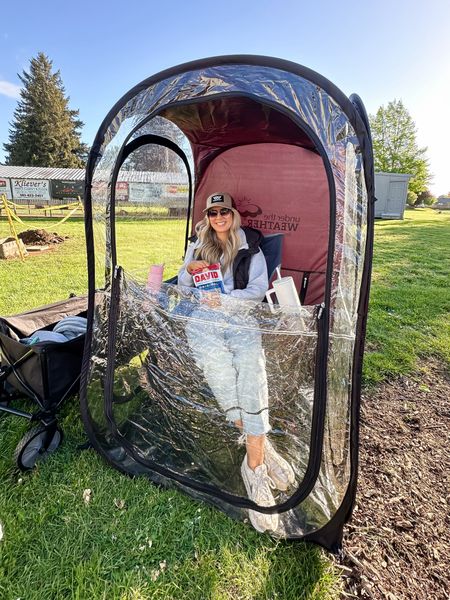 Best money I’ve ever spent was on this weather proof tent for my kids spring sports 😅 

It keeps you dry when it’s raining, it keeps you warm when it’s windy and cold. You can fully zip yourself in, or leave the door half open. 

Level up with a heated chair to really make it a luxury experience 🤣

#LTKkids #LTKfindsunder100 #LTKfamily