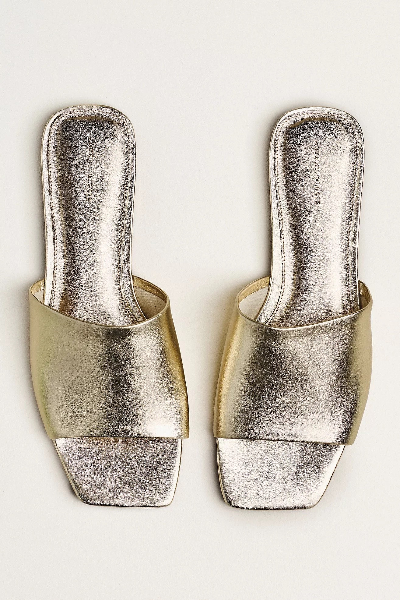 I just bought these shoes and they are so comfortable. 

I love the metallic gold and they have 5 other colors in leather or suede. 

The pink suede is in my cart as we speak. 

The perfect stylish sandal for summer. 

Anthropologie • summer shoe • slide sandal • metallic sandal

#LTKootd #LTKOver40 #LTKWorkwear