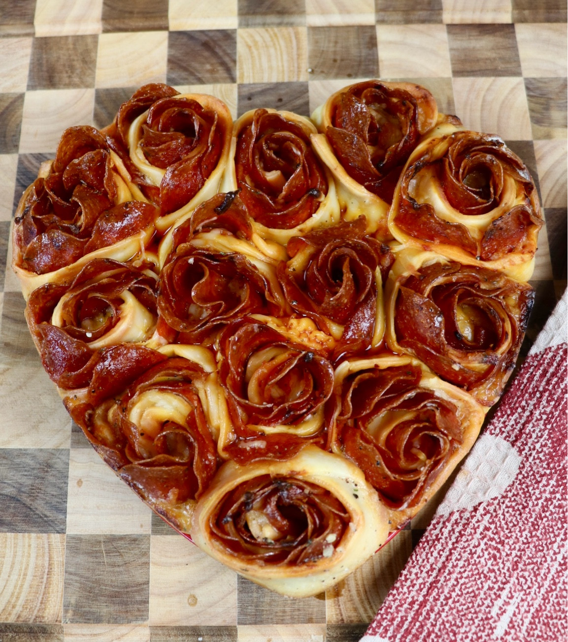 Pizza roses in a heart-shaped pan!

#LTKParties #LTKHome #LTKSeasonal