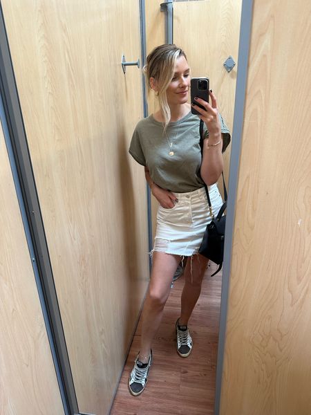 White denim skirt
Camo golden goose
Shopping outfit
Skirt and tee outfit with sneakers
Free people tshirt 