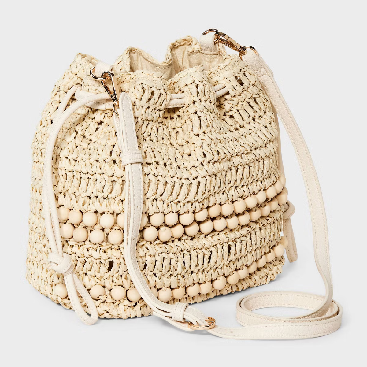 Straw Beaded Drawstring Crossbody Bag - Universal Thread™ Light Beige | Target