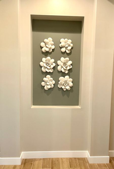 #wallart #homedecor #floralwallart #ceramicflowers #wallhanging #hallway #home #hosusewarming

#LTKGiftGuide #LTKhome