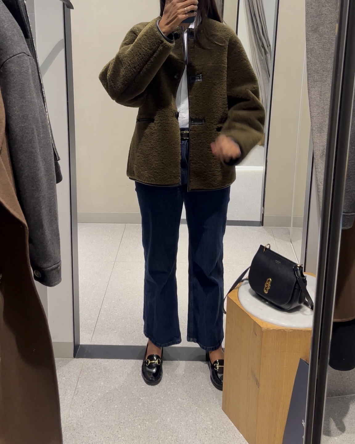 Popped into @mango just to try on the chocolate scarf coat from my previous post…and of course they didn’t have it in store! Tried these styles instead.

1. Khaki shearling jacket The jacket that was absolutely everywhere last year gets a khaki update. Did think it was cute and loved the knot buttons. 

2. Short grey jacket. There’s variations of this boxy short jacket all over the high street and I do think this is a quality pick. Felt more premium than the price point. 

3. Chocolate brown oversize coat. I am SO a creature of habit. I have the same coat in a stone colour from last year and I absolutely love it and I love this new colour way. Hundred percent had to stop myself buying it. 

Side note…totally bugs me that these jeans are not long enough!

Which is your favourite?

#mangolover #mango #over40style #over40fashion 
#autumnoutfits #coats #coatseason #over30style #over30fashion

#LTKeurope #LTKautumn #LTKuk