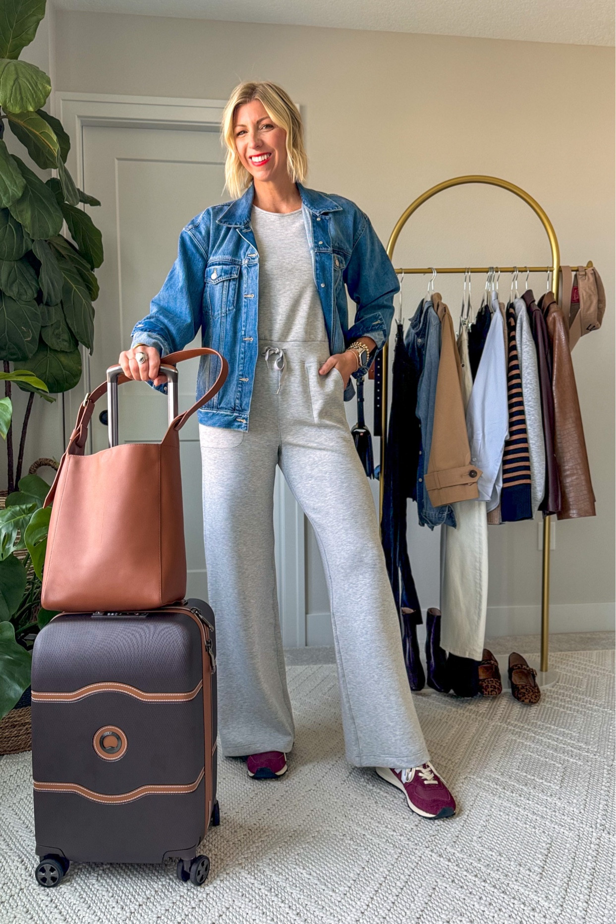 Fall travel outfit idea! I love a comfy and chic jumpsuit for a travel day plus an easy two layer denim jacket plus sneakers. 
Use my code: SARAHKELLYXSPANX for 10% off my jumpsuit 

#LTKOver40 #LTKStyleTip #LTKTravel