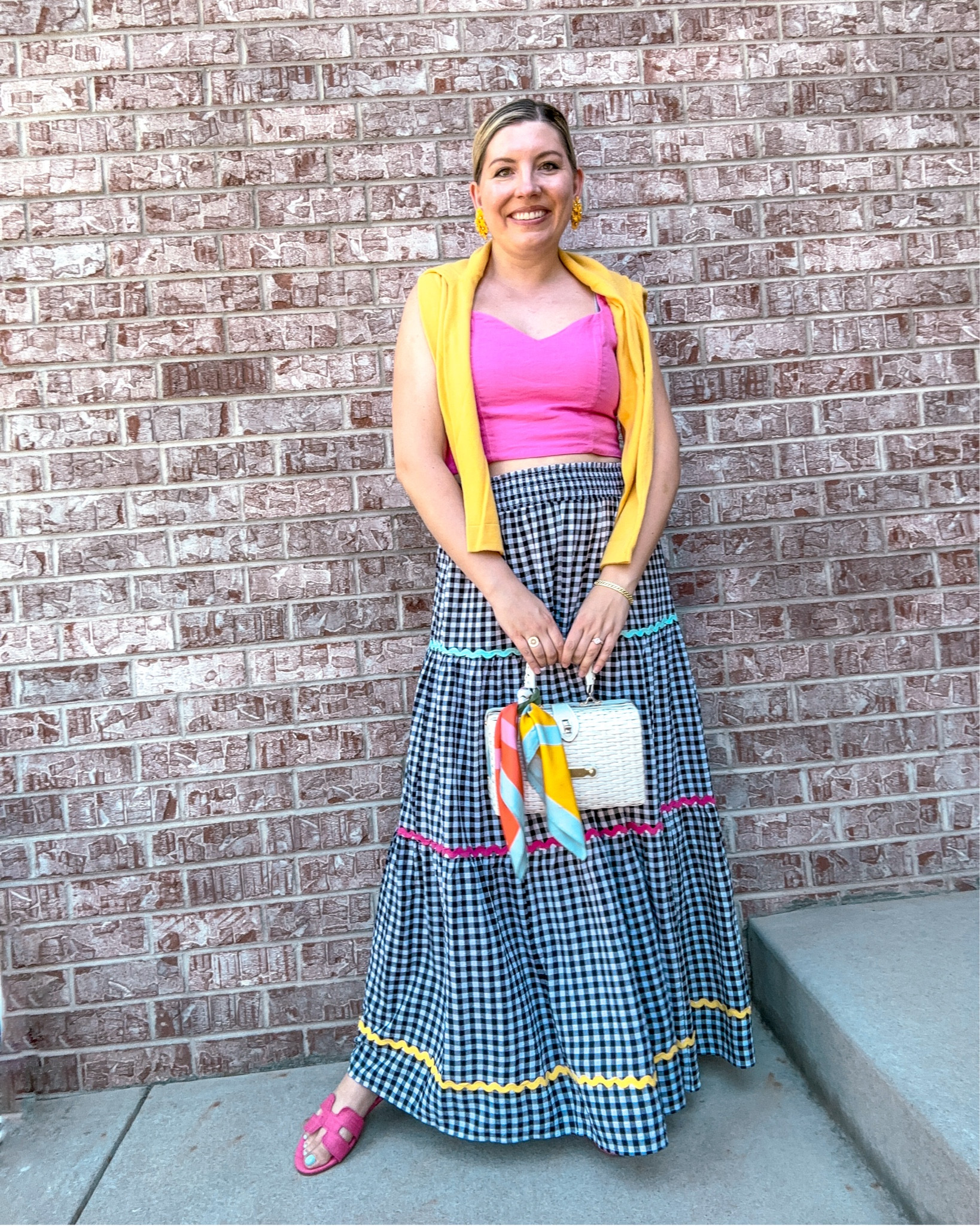 Look 4
Main Street Muse 🎡 
A curated style series

This look was such a joy to put together - bold but easy, colorful but wearable. The star is this fabulous maxi skirt with a rickrack detail (you know I can’t resist rickrack ✨ ), paired with a simple thrifted top to balance it out. I realized this Tory Burch scarf matched every color in the skirt- so of course it had to come along for the adventure tied on my purse. 

To me, this is the kind of look that feels effortless but still makes a statement. Wearable does not need to be understated.

🎡 About this capsule:
Each of my capsule collections is a themed two-week style journey. Main Street Muse celebrates the in-between season—the last golden glow of summer as it slowly transforms into fall. It’s nostalgic, colorful, and romantic, with a touch of small-town Americana charm. Inspired by end-of-summer fairs, vintage details, and joyful styling that makes everyday moments feel a little more magical.

Top - Target (thrifted, past season)
Sweater - J Crew Factory (similar linked)
Skirt - Belk (Crown & Ivy) (similar linked)
Bag - Vintage (similar link)
Earrings - Dillards (the nat note summer collab) 
Scarf - Tory Burch
Ring - Rocksbox (similar linked)
Bracelet - Rocksbox 
Sandals - Belk (crown and Ivy - linked)

#MainStreetMuse #CapsuleCollection #ColorBlockStyle #MaxiSkirtLook #RickrackDetail #VintageInspiredFashion #ThriftedFinds #ToryBurchStyle #PlayfulStyle #WearableFashion #ColorfulStyle #MainStreetStyle #SummerToFallStyle #TransitionalStyle #EclecticStyle #FashionStorytelling #LTKstyle #LTKfashion
