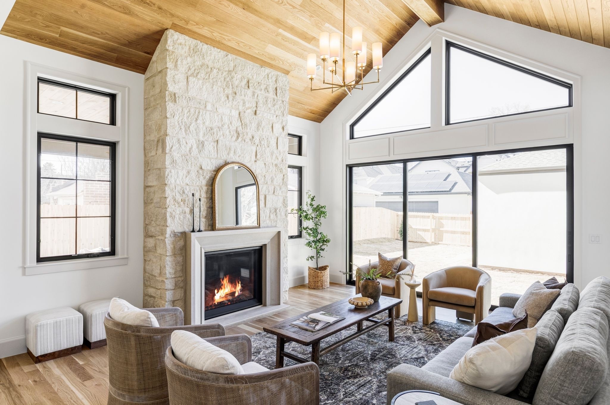 Velvet side chairs, vintage inspired rug and coffee table with gold arch mirror complete this living room. 

Organic, modern, McGee and co, amber interiors, loloi

#LTKHome