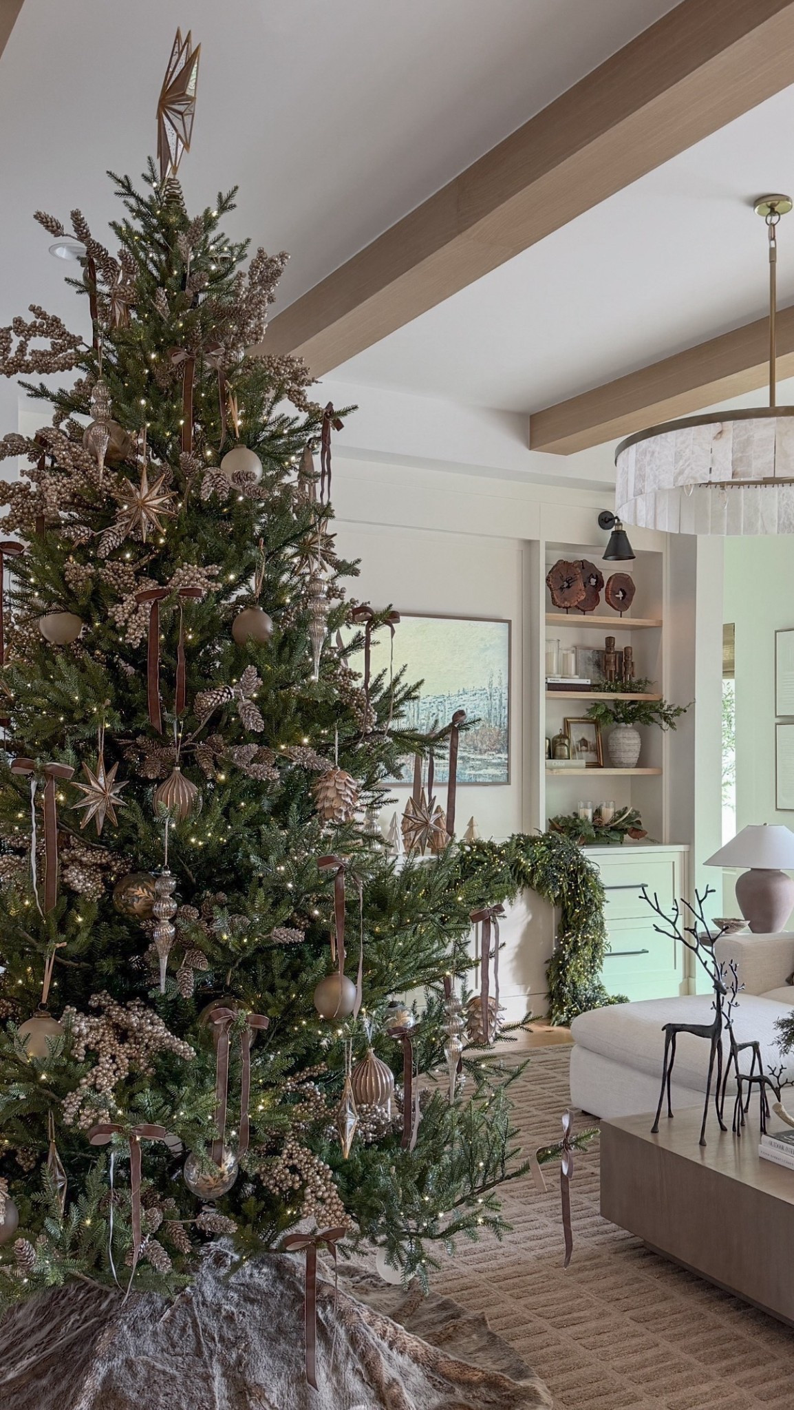 
Daytime holiday view

holiday decor, Christmas decor, winter decor, garland, lit garland, cedar garland, pine garland, juniper garland, thick garland, realistic garland, mantle garland, staircase garland, holiday greenery, Christmas greenery, faux greenery, wreaths, lit wreath, oversized wreath, classic wreath, holiday foliage, stems, juniper stems, cedar stems, holiday florals, magnolia leaves, holiday branches, evergreen branches, gold bells, rustic bells, bronze bells, decorative bells, holiday candlelight, taper candles, pillar candles, flameless candles, LED candles, glass candle holders, cut glass candles, gold candle holders, holiday glow, tablescape decor, Christmas tablescape, holiday centerpiece, winter centerpiece, coffee table decor, console styling, shelf styling, entryway decor, Christmas tree decor, ornament sets, gold ornaments, brown ornaments, metallic ornaments, ribbon, velvet ribbon, silk ribbon, tree ribbon, holiday stockings, knit stockings, designer stockings, stocking holders, Christmas accents, festive accents, cozy holiday home, organic modern holiday, Mediterranean holiday decor, Pottery Barn holiday, McGee & Co holiday, Anthropologie inspired, Amazon holiday finds, neutral holiday decor, warm holiday tones, winter whites, earthy neutrals, gold accents, bronze accents, seasonal sparkle, cozy textures, faux fur throws, knit throws, holiday pillows, winter pillow covers, twinkle lights, LED twinkle trees, lit birch trees, holiday lanterns, glass cloches, decorative trays, gold trays, marble trays, coffee table styling, mantle styling, entryway styling, festive home ideas, Christmas decorating ideas, elevated holiday home, budget-friendly holiday decor, luxury holiday look, designer-inspired decor, reindeer decor, holiday sculptures, wooden nutcrackers, rustic Christmas, modern Christmas, timeless holiday style, winter hosting, holiday hosting essentials, entertaining decor, festive home inspiration, elegant holiday vibes

#LTKHoliday #LTKSeasonal #LTKHome