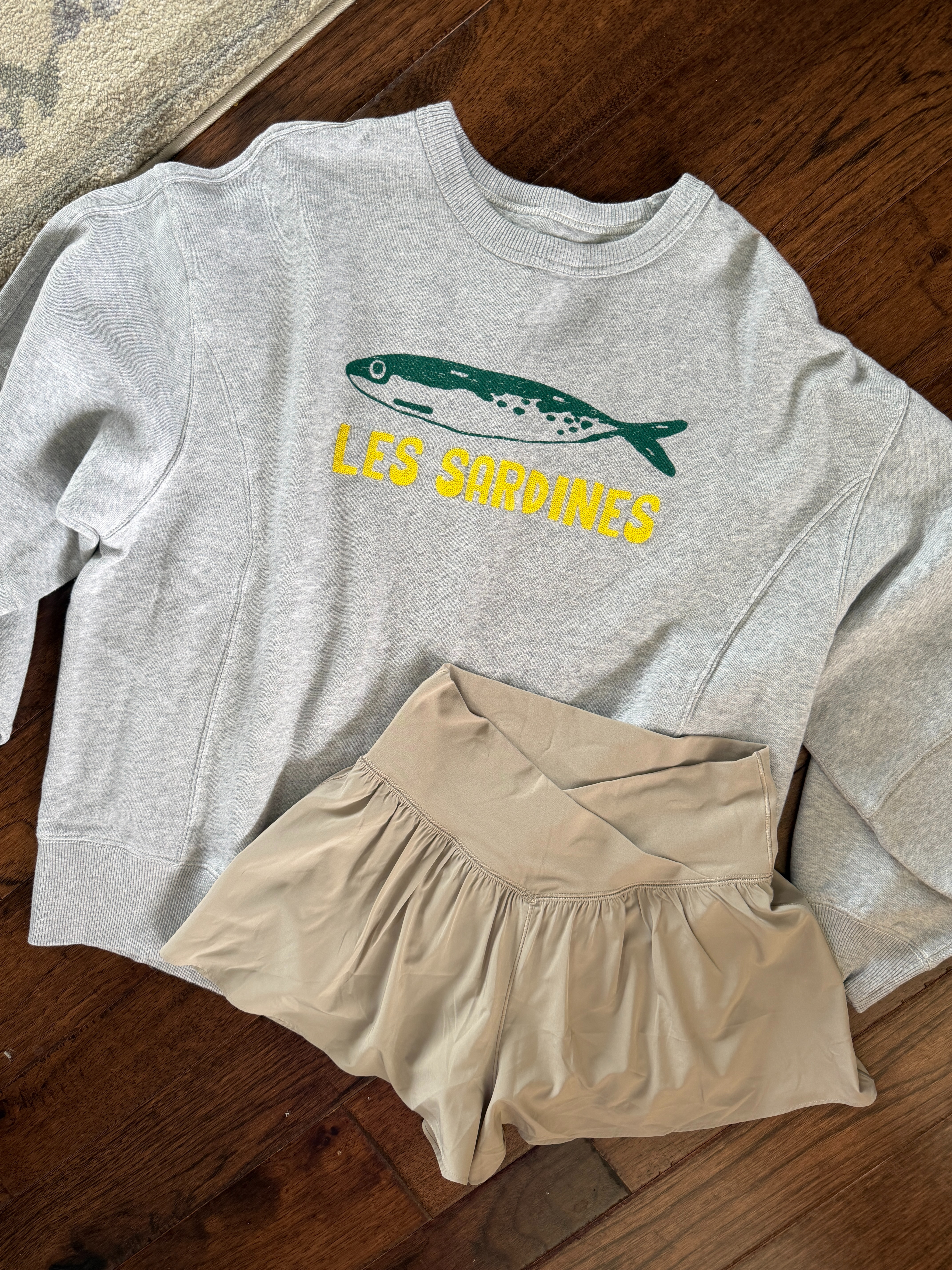 Aerie finds! These flowy crossover shorts are so cute and fun for spring! Obsessed with this crewneck with the oversized fit and longer length! Both pieces on sale now. 

 #LTKootd #LTKSeasonal #LTKSaleAlert