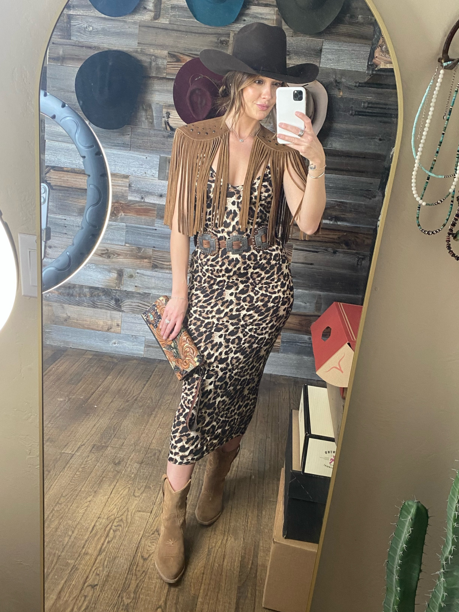 Serving up wild west vibes for NFR | Leopard print meets fringe magic, with a side of cowboy chic 🤠🖤 #howdylandstyle  #leopard #westernstyle #nfr #nfrfashion #nfrstyle #fashion #style #westernfashion #westernfashioninfluencer #cowgirl #cowgirlstyle #cowgirlchic #cowgirlfashion #blackfriday #thanksgiving

#LTKGiftGuide #LTKFindsUnder50 #LTKStyleTip