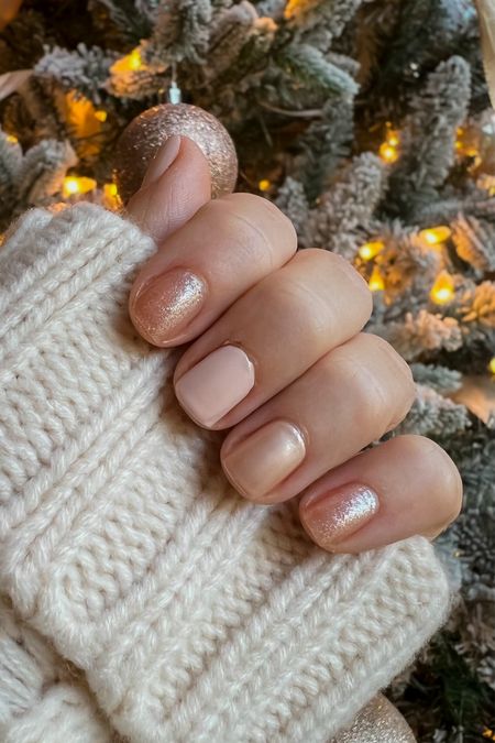 Any or all of these nail colors would be so pretty for your NYE mani!
Pointer and pinky are OPI salty sweet nothings. Ring is butter LONDON champagne princess. Middle is 786


#LTKstyletip #LTKbeauty #LTKSeasonal