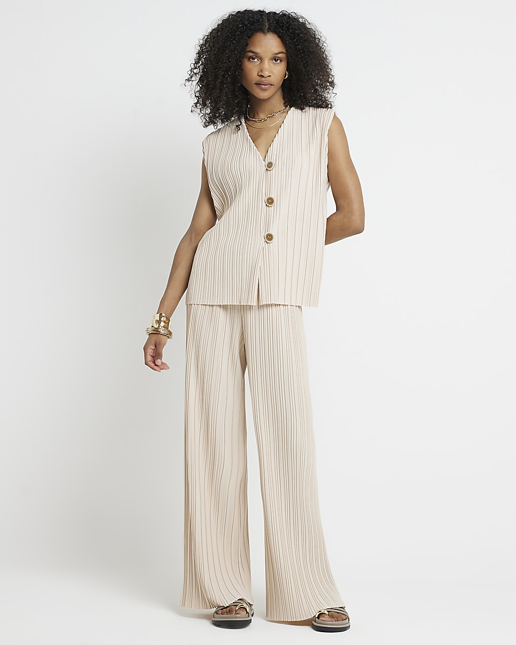 Beige plisse wide leg trousers | River Island (UK & IE)