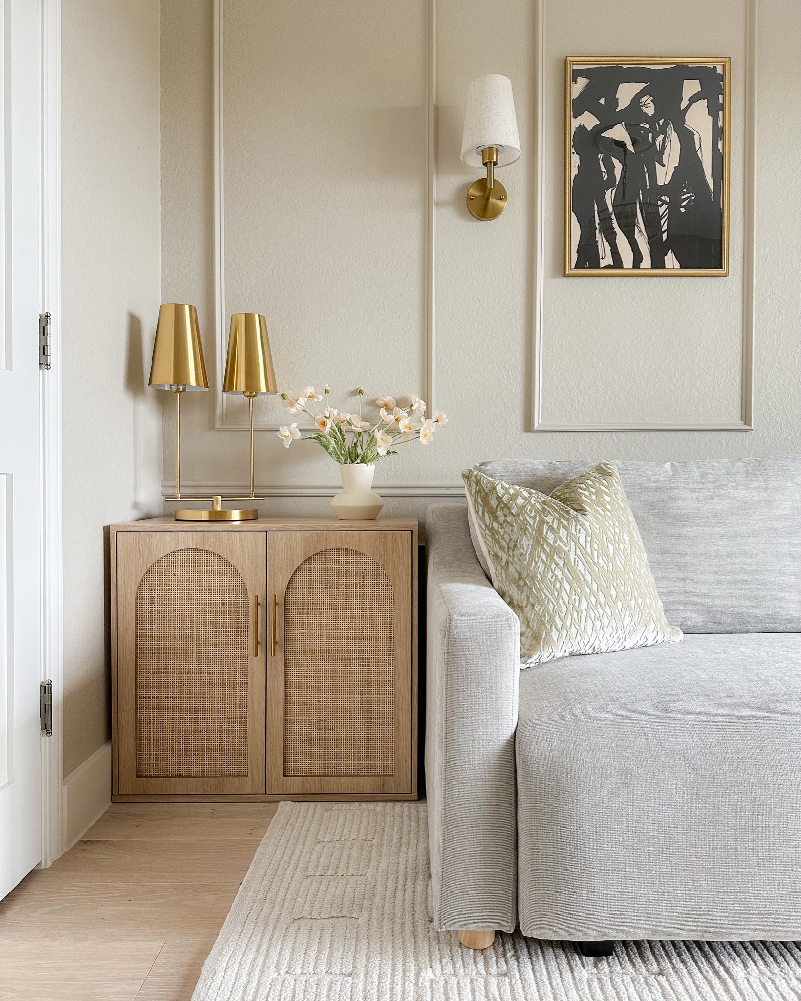 Affordable arch rattan cabinet I used and a side table! I just didn’t attach the legs for a cleaner look! Also love that modern library style gold lamp! 

#LTKstyletip #LTKfindsunder100 #LTKhome