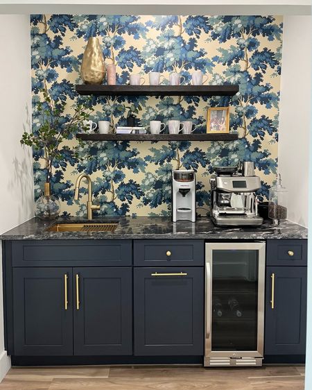 Our coffee nook! I love this little space in our house 🤍

Sandberg wallpaper. Coffee room. Coffee nook. Espresso machine. Clear bulb vase. Navy cabinets. Gold hardware. Amazon home finds. Breville. Interior design. 

#LTKhome