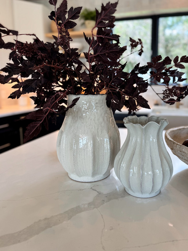 These sculptural white vases from Target have the prettiest shape and texture.