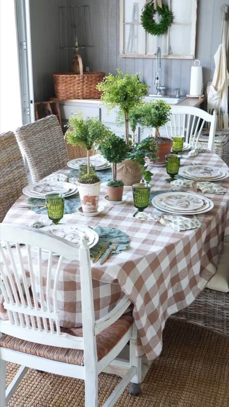 I love everything about this Spring table
setting!

The brown buffalo check tablecloth and green block print napkins were perfect for my neutral tablescape with topiaries.

These would work with any season and the tablecloth and napkins come in lots of other colors.

#springtablesetting #springdecor
#entertaining #tablesetting #tabledecor


#LTKSeasonal #LTKhome #LTKfindsunder50