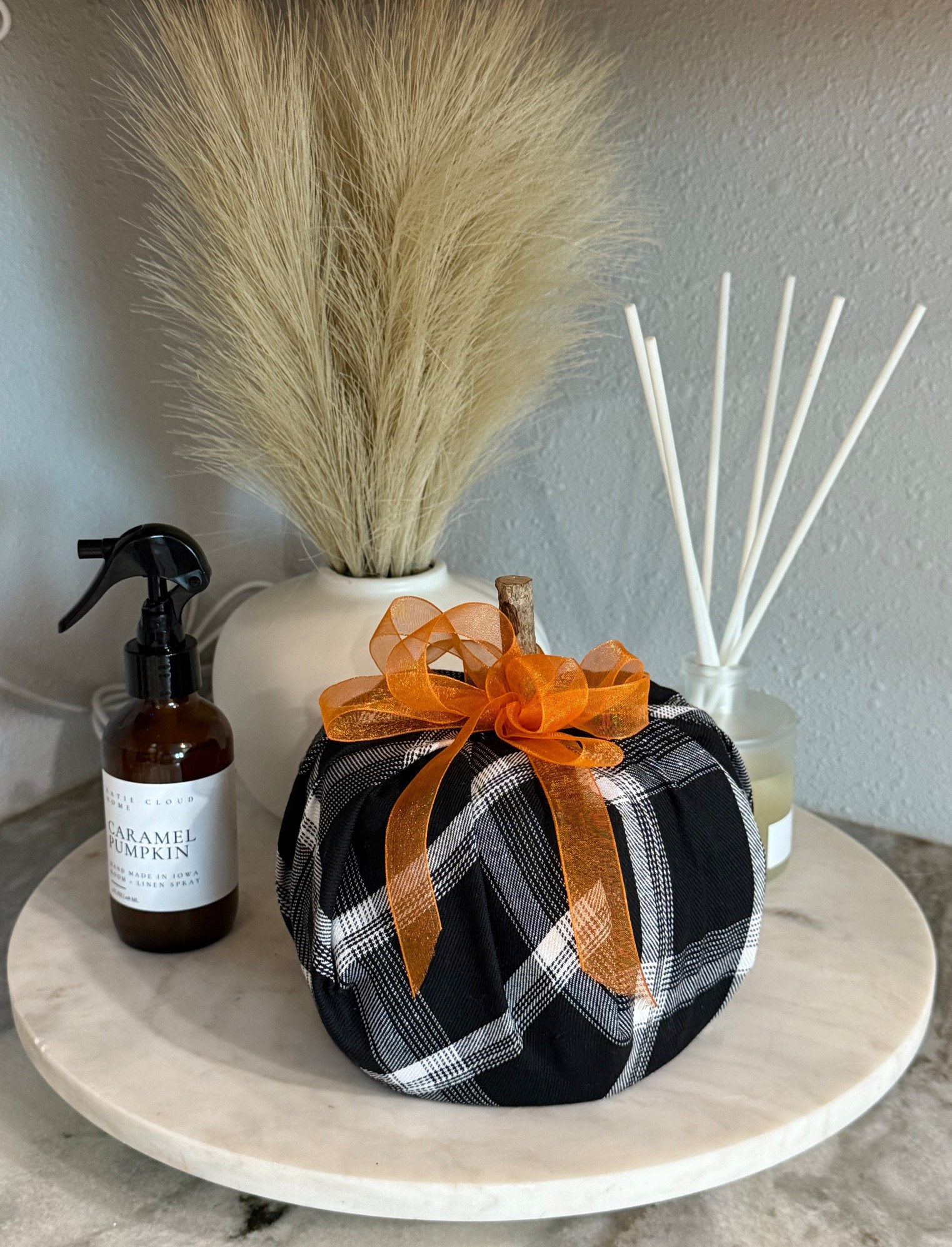 I styled the marble lazy Susan in our kitchen to a fall look! Our exact lazy Susan is sold out so I linked similar ones! The pumpkin is a diy toilet paper pumpkin - so you need fabric, toilet paper and a stick for the stem! Also, if you haven’t checked out Katie Cloud Home - do it!! So good #falldecor

#LTKFallSale #LTKSeasonal #LTKHome