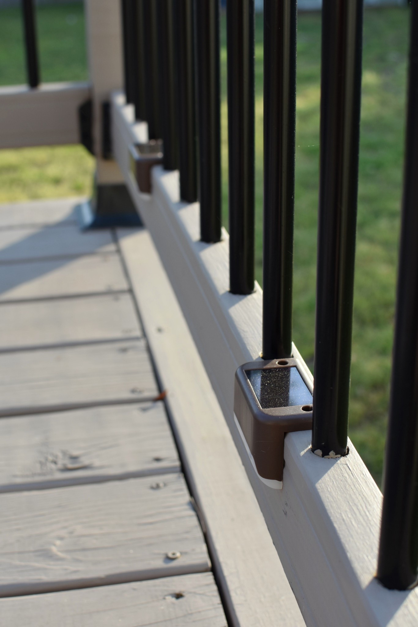 I’m so impressed with these solar lights!! We put them low in the rails and they put off the perfect amount of light — enough to see without the big light on at night, but our house isn’t glowing in the neighborhood. Get more than you think you’ll need! I’m ordering a second box  