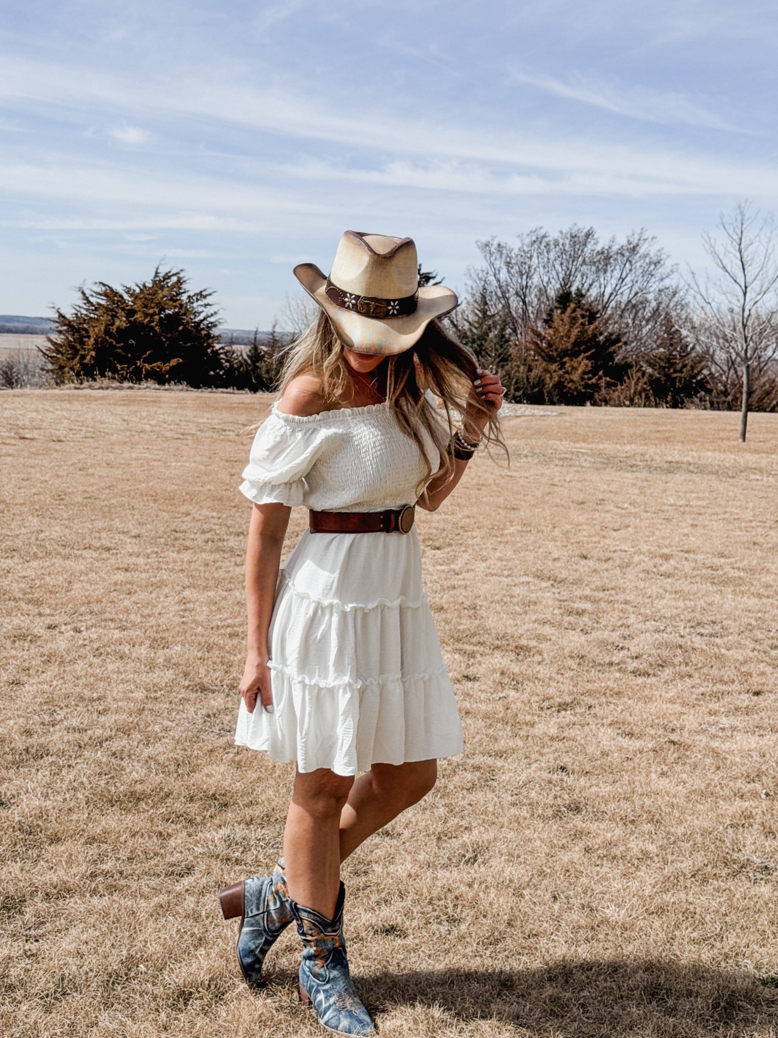 Every piece of this look is so good! 🤠 If you are headed to a country concert this spring or summer or to a festival, this look would be perfect! Wearing a small in the dress. 

As an Amazon Influencer I earn commission on qualifying purchases.

Country concert outfit inspo, mom style, festival fit inspiration, cowgirl boots, denim boots, cowgirl belt, off the shoulder white dress, spring style 

#LTKMidsize #LTKootd #LTKFestival