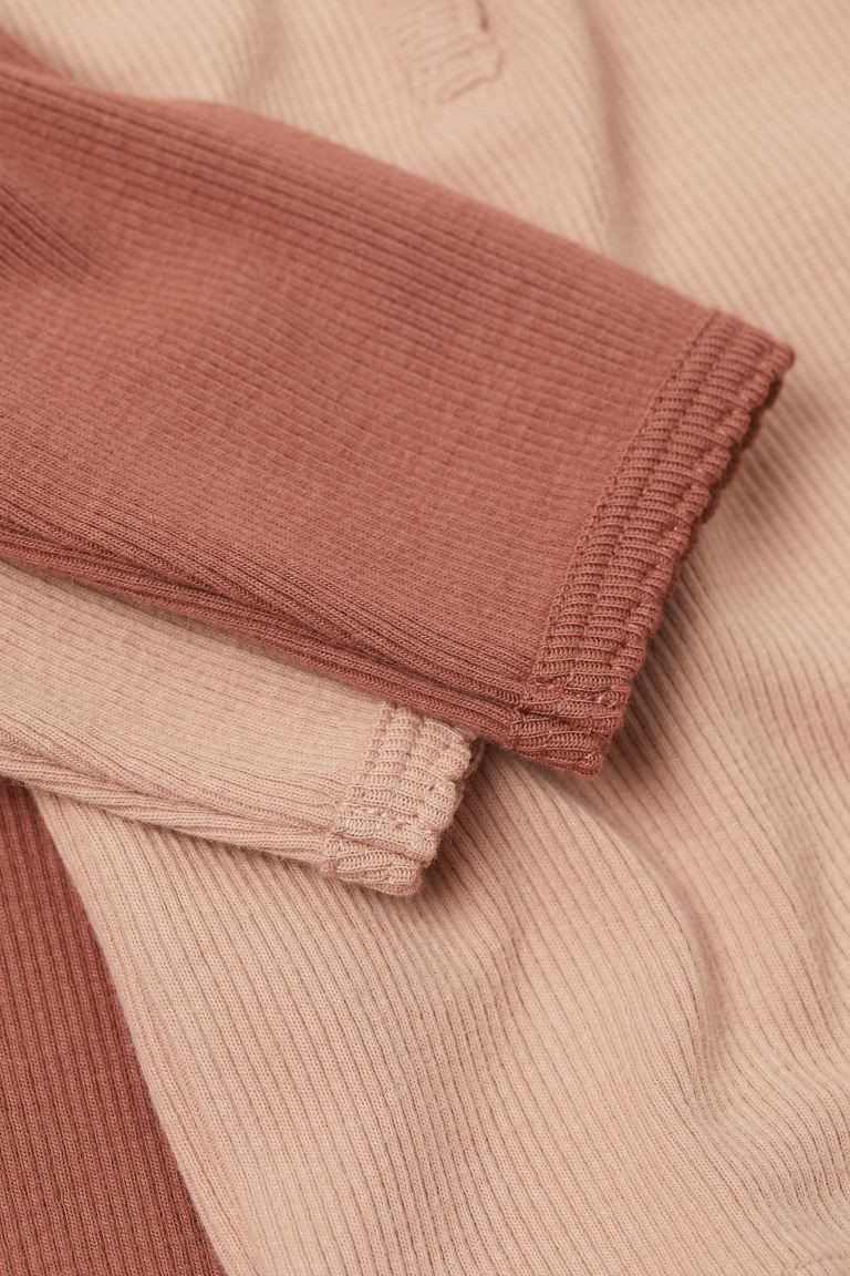 Baby Exclusive. Long-sleeved tops in ribbed, organic cotton jersey. Button placket and scalloped ... | H&M (US + CA)
