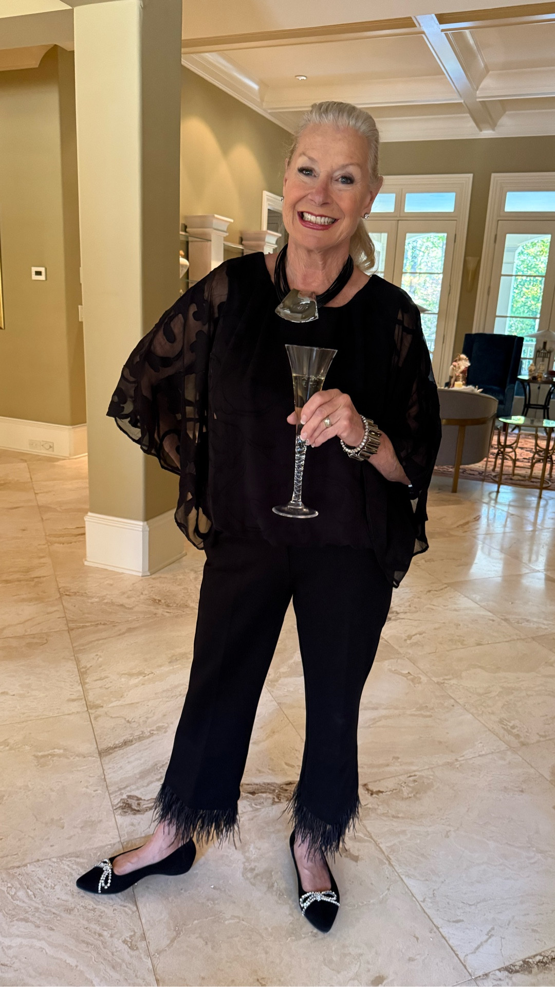 Where diamonds meet feathers,
Elegance takes flight.

Looking for the perfect little black outfit that you can wear throughout the holidays and ring in the new year?

Well ladies I think this outfit from Chico’s is the one!
You will love the Chiffon Burnout Bubble-Hem Top with the Juliet Feathered Flare Cropped Pants.
Wear this with your favorite diamonds and you’re guaranteed to get heads turning !

#LTKHoliday #LTKMidsize #LTKOver40