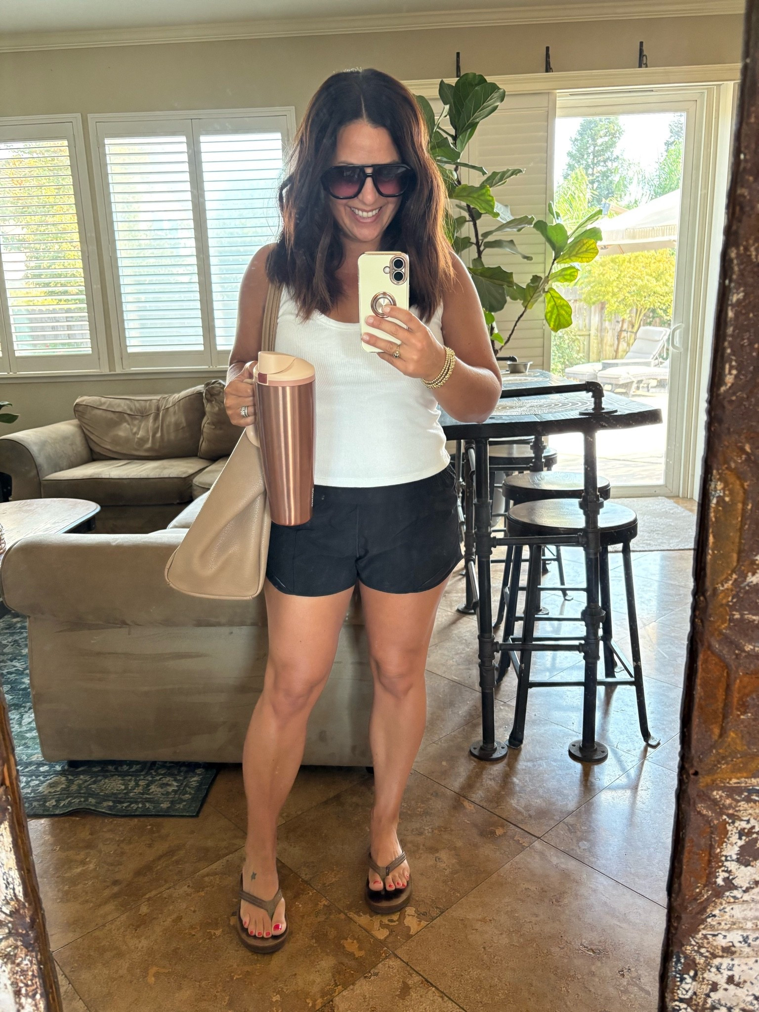 Basketball Tournament Day 🏀

Keeping it easy and comfortable for a full day at the basketball tournament! This is one of my favorite formulas for a casual summer outfit: a fitted white tank, lightweight black shorts, comfy sandals, an oversized tote, and my favorite insulated tumbler. Simple, comfortable, and still put-together enough for running around all day.

Shop this casual summer outfit, basketball tournament outfit, mom outfit, black shorts, white tank top, summer sandals, tote bag and everyday accessories

#LTKootd #LTKActive #LTKmomlife