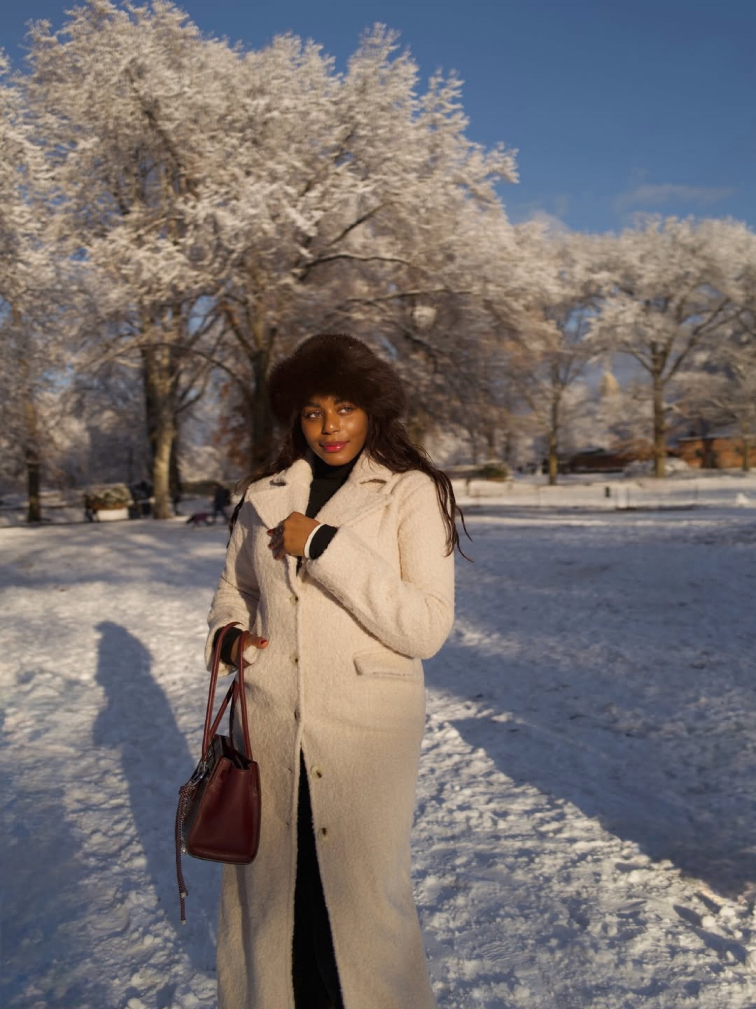 Bundled up in my coziest winter outfit idea for the snow! Wearing cute faux fur hat and boots, cream coat, black turtleneck and leggings and burgundy handbag from Michael kors. Love this cute and cozy winter outfit idea! .. For more links to stocking stuffers, makeup bag, snow boots, holiday party dress finds, follow me on LTK! ✨

#LTKgrwm #LTKHoliday #LTKootd