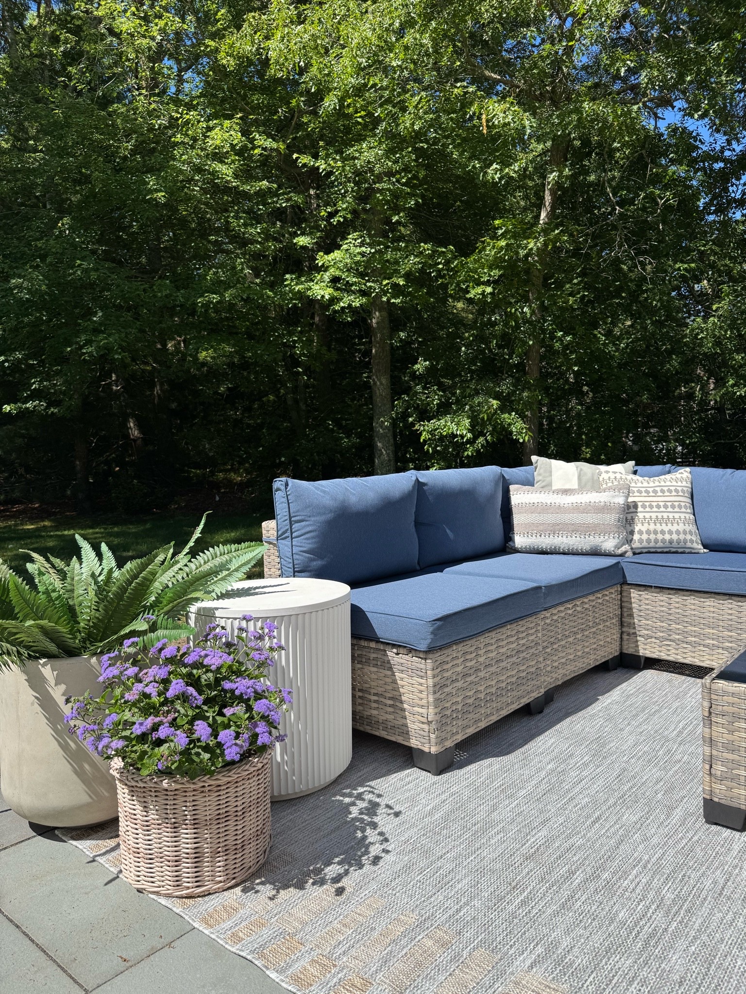 We’ve been spending as much time outside as possible lately, and this patio setup has become one of our favorite spots. 🌿 The sectional comes with a coffee table, the cushion covers are washable, and it’s available in multiple colors. Add a cooler side table, a cozy rug, planters, and a faux fern, and the space feels complete. ☀️✨

#ad
#wayfairpartner
#WayfairPicks
#wayfair
@wayfair 
#liketkit

#LTKHome #LTKSeasonal