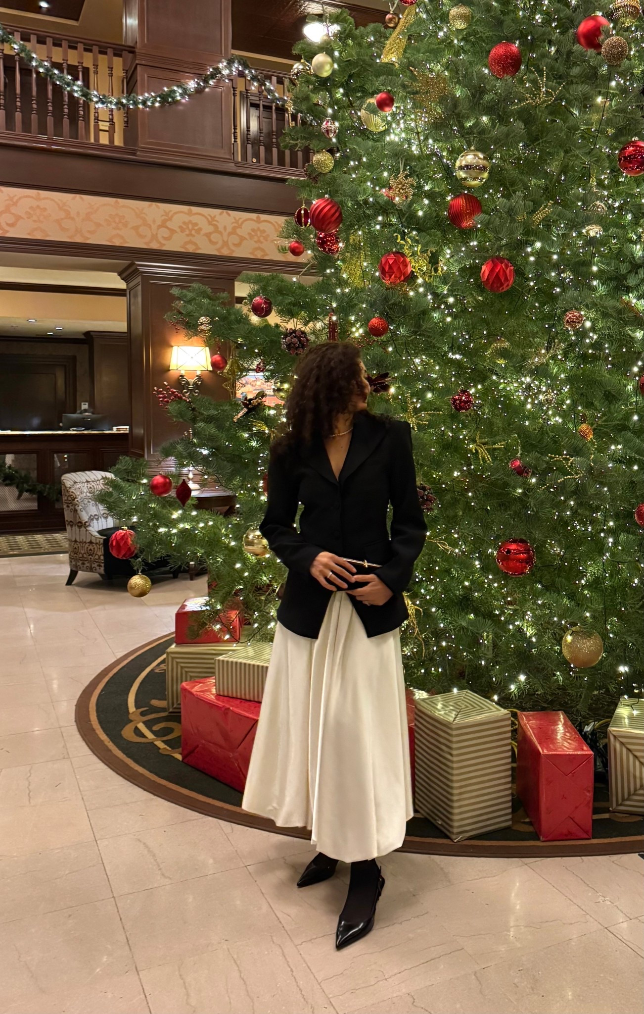 Classy holiday outfit with a skirt, blazer, clutch, and slingback heels. 

#LTKHoliday