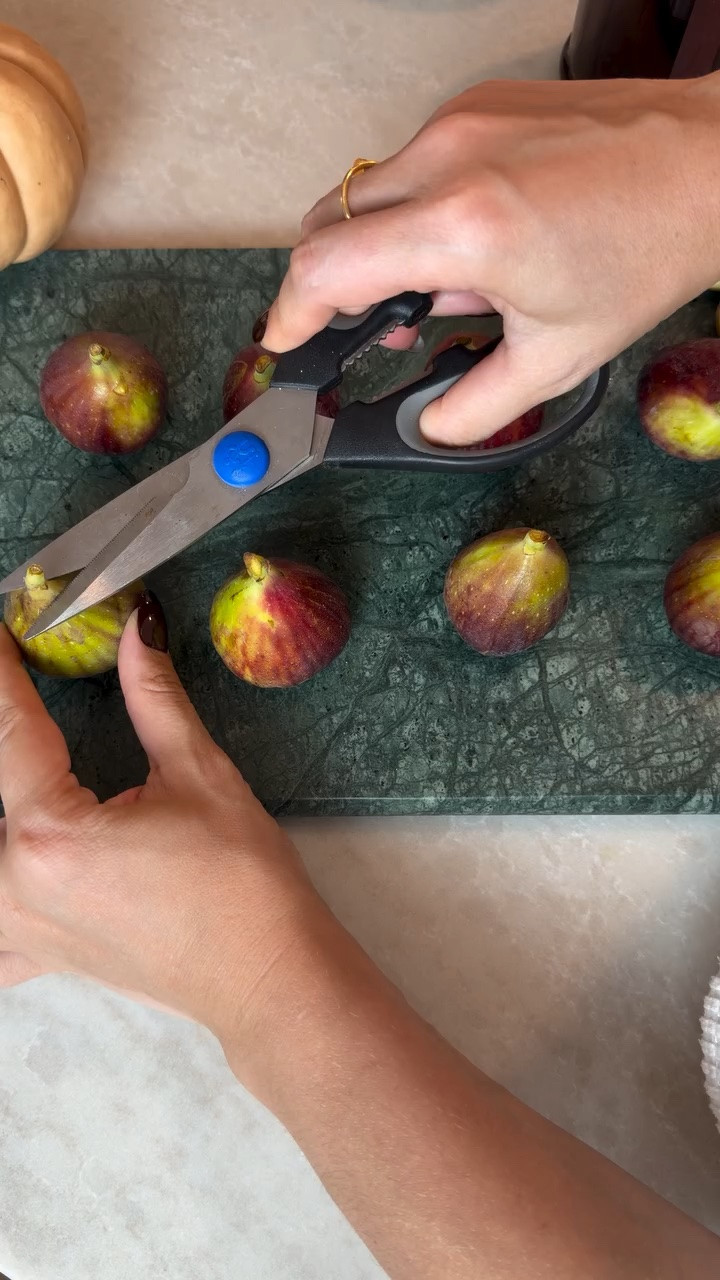 Save this fig, goat cheese, and honey recipe for the perfect fall appetizer when you’re hosting! 🍂

Cut off the fig stems, then slice each fig into four sections without cutting all the way through. Stuff with goat cheese and chopped walnuts, then drizzle with honey.

Bake at 375°F for about 10 minutes, until warm and softened. Serve with sliced baguette or crackers and enjoy!

You can also substitute Brie for the goat cheese. 🤎 

Marble board is from @allmodern