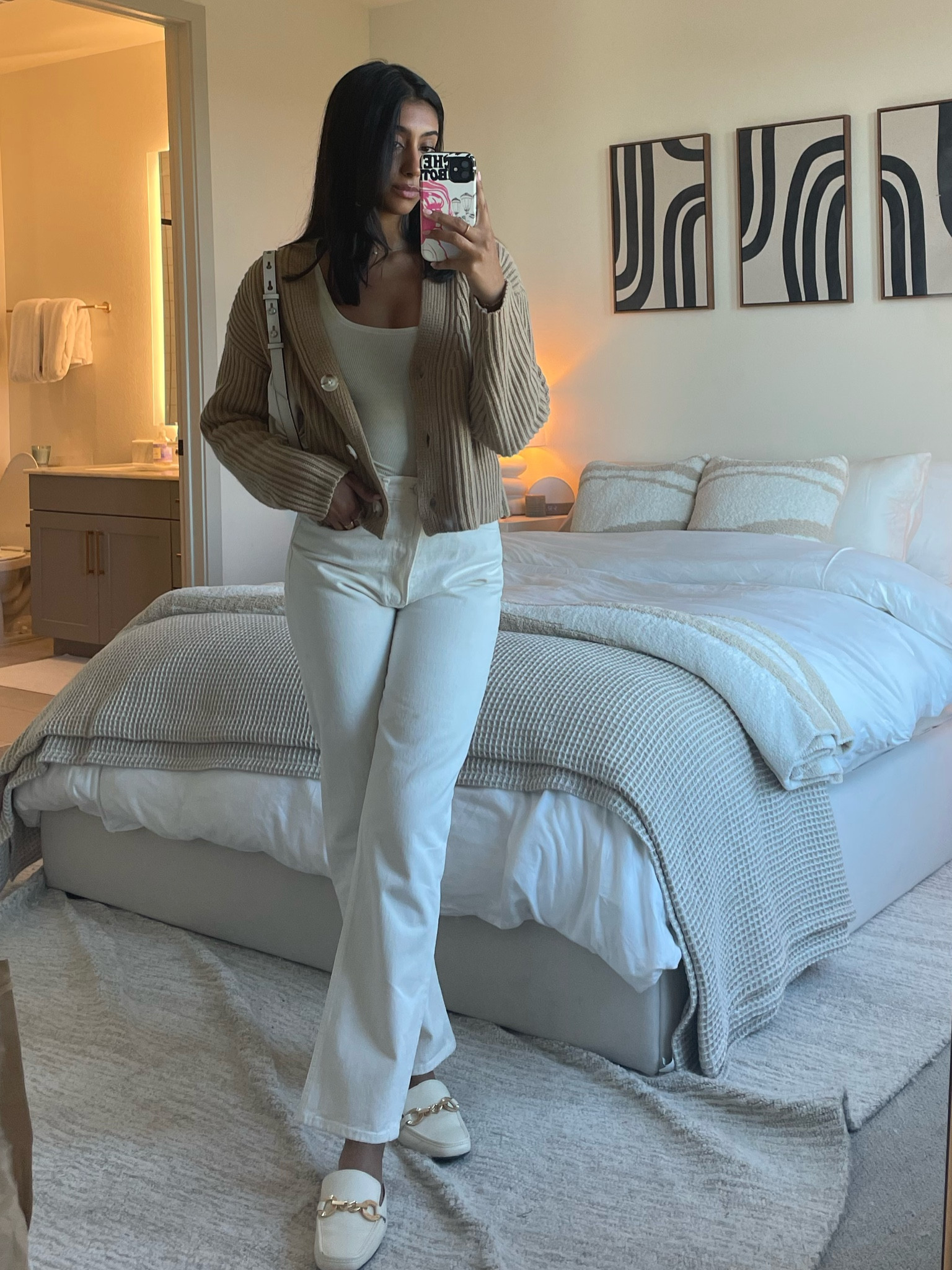 Warm neutrals for a casual dinner outfit tonight! A cream tank, white straight leg jeans, brown cardigan, and loafers🤍🤎

#LTKFind #LTKSeasonal #LTKstyletip