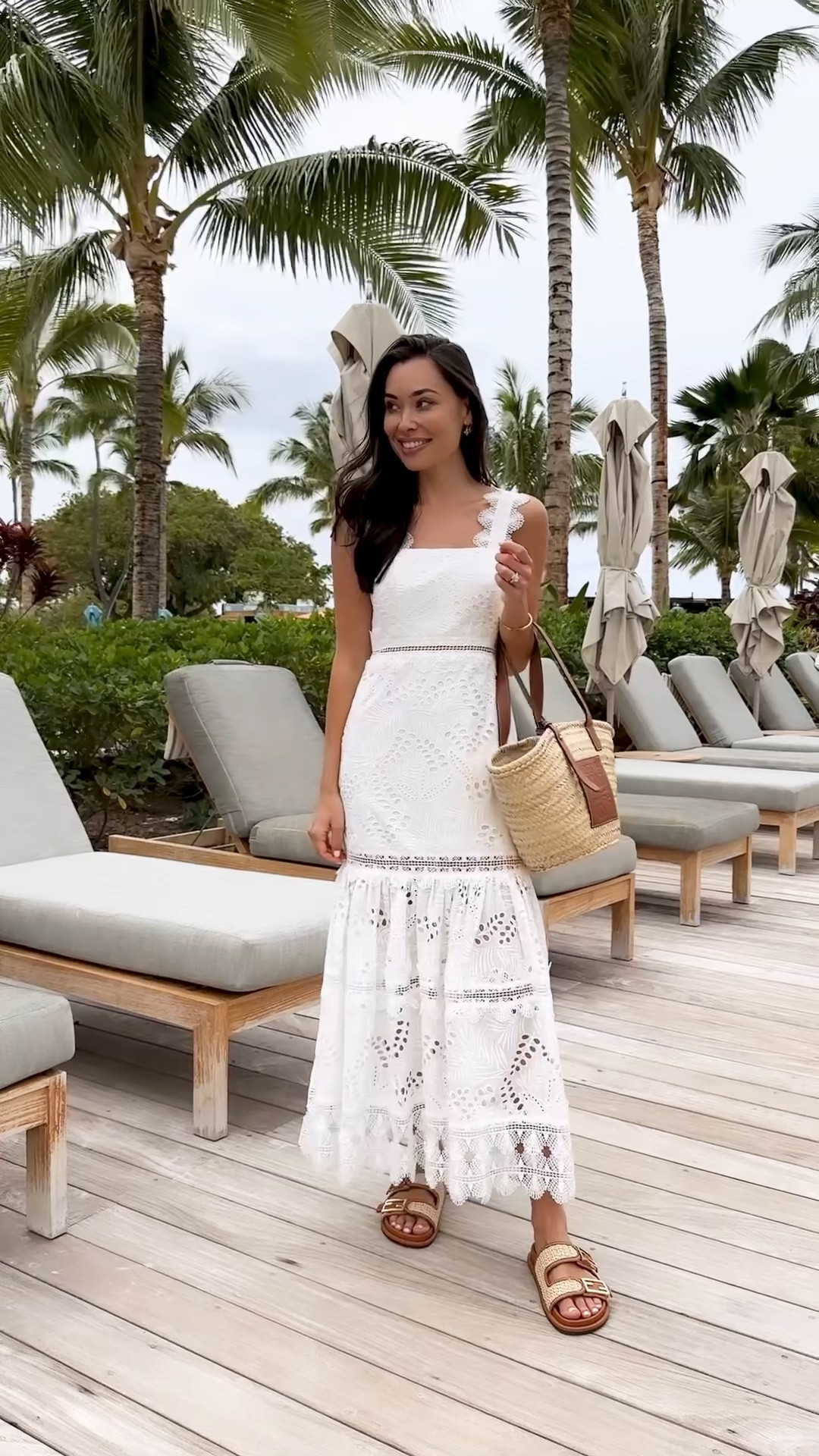 Kat Jamieson wears a white eyelet dress, sandals and a straw tote from @saks. Spring outfit, vacation outfit, spring sandals, white dress, midi dress, classic style. #saks #sakspartner

#LTKtravel #LTKwedding #LTKSeasonal