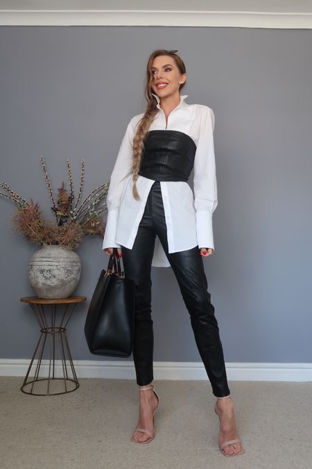 Karen Millen white oversized shirt and black leather corset with black
Leather trousers 

#LTKeurope #LTKSeasonal #LTKstyletip