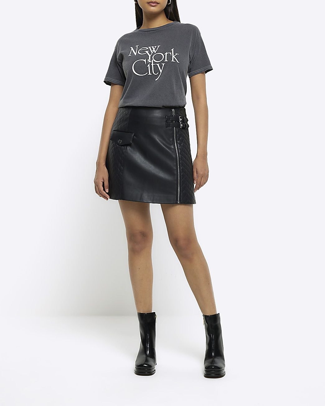 Black faux leather quilted mini skirt | River Island (US)
