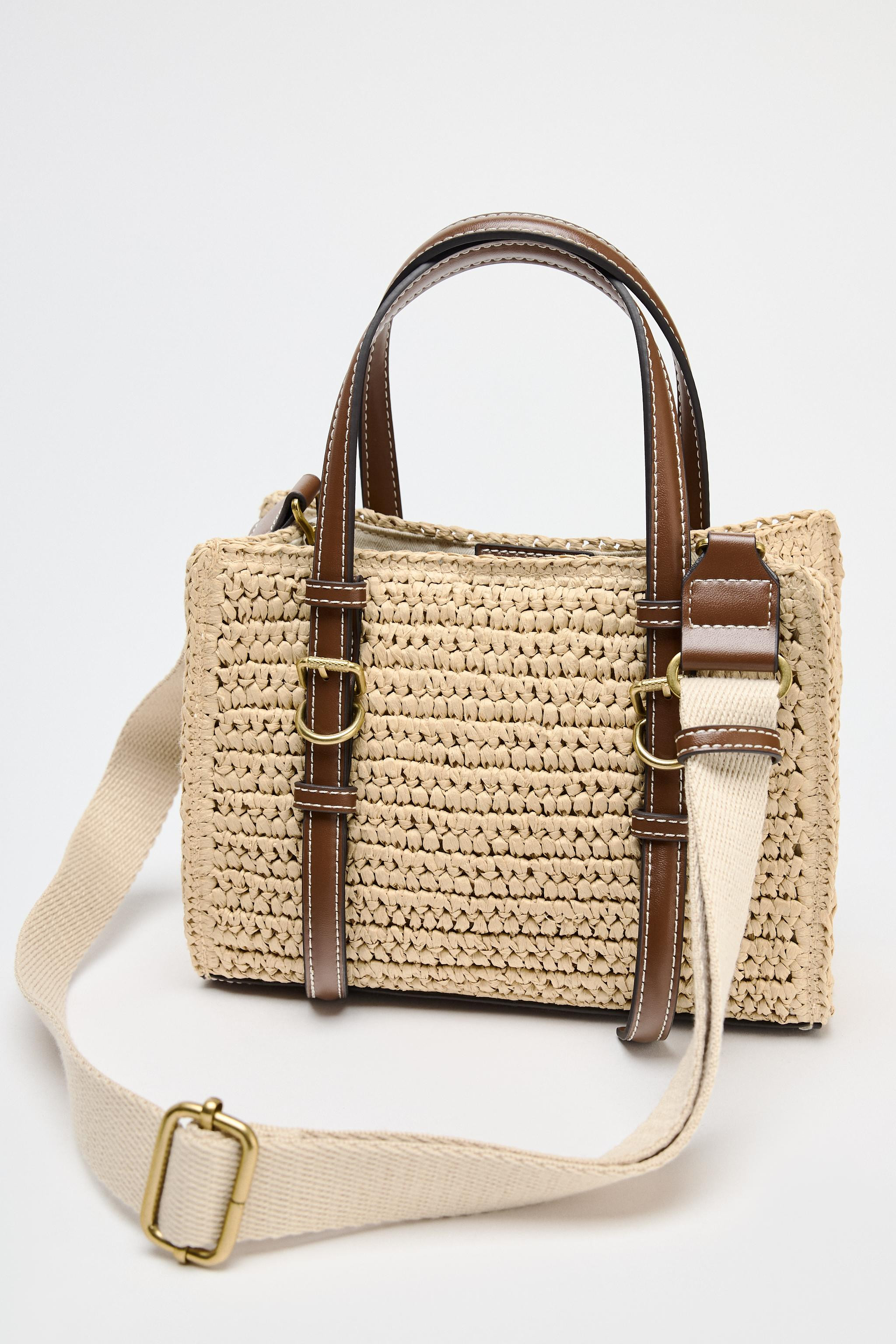 Mini tote bag with a woven design. Buckle straps detail on the front. Handles and a removable cro... | Zara US