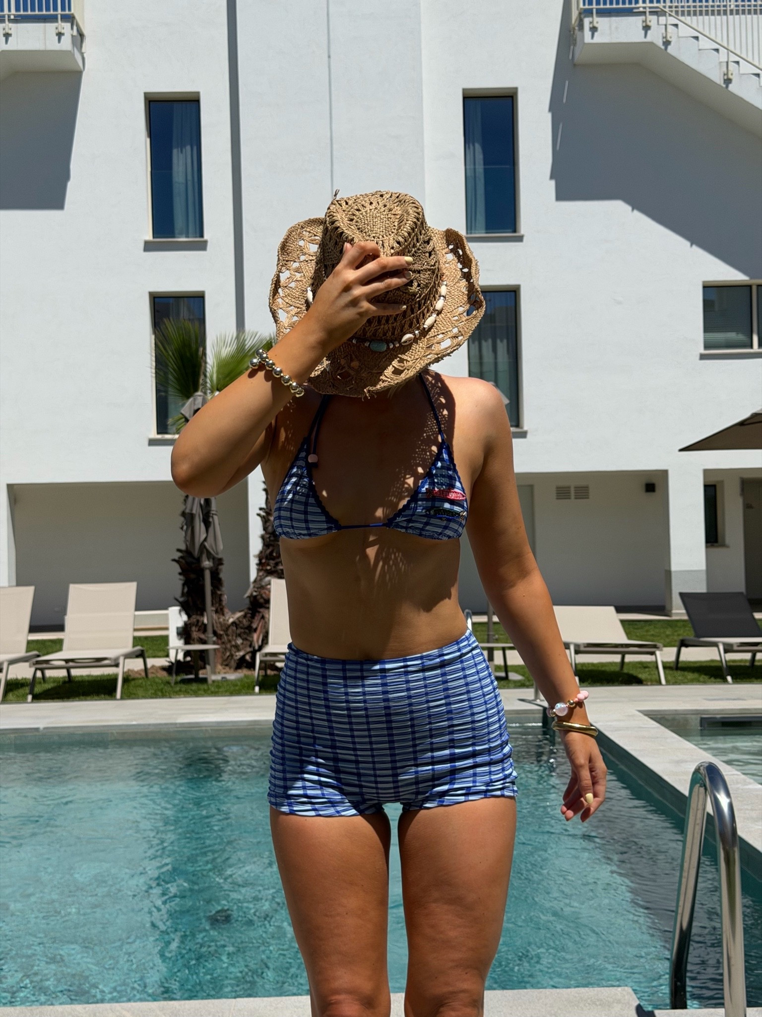 Bikini shorts outfit, beaded bikini, cowboy hat

#LTKeurope #LTKsummer