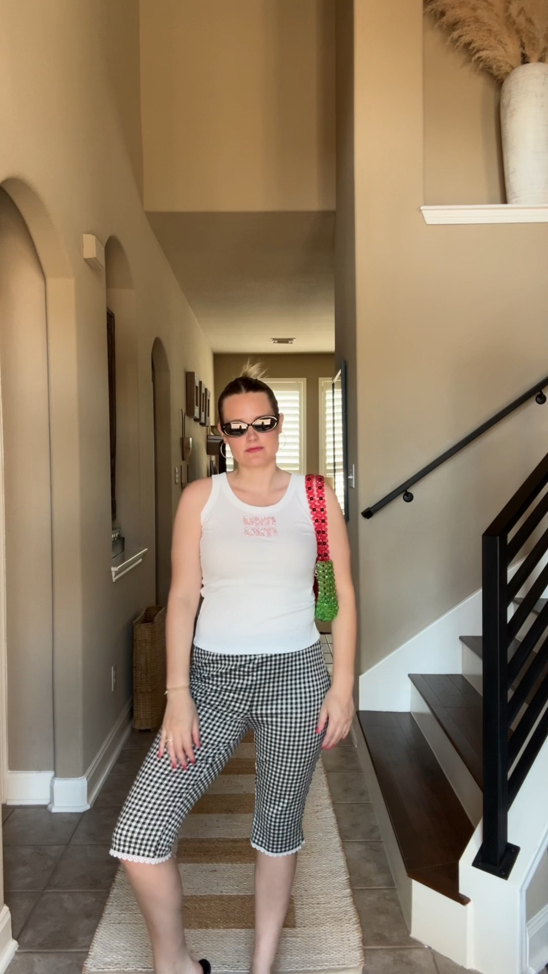 Summer outfit, capri pants, kitten flip flop, oval sunglasses, beaded purse 

#LTKTravel #LTKStyleTip