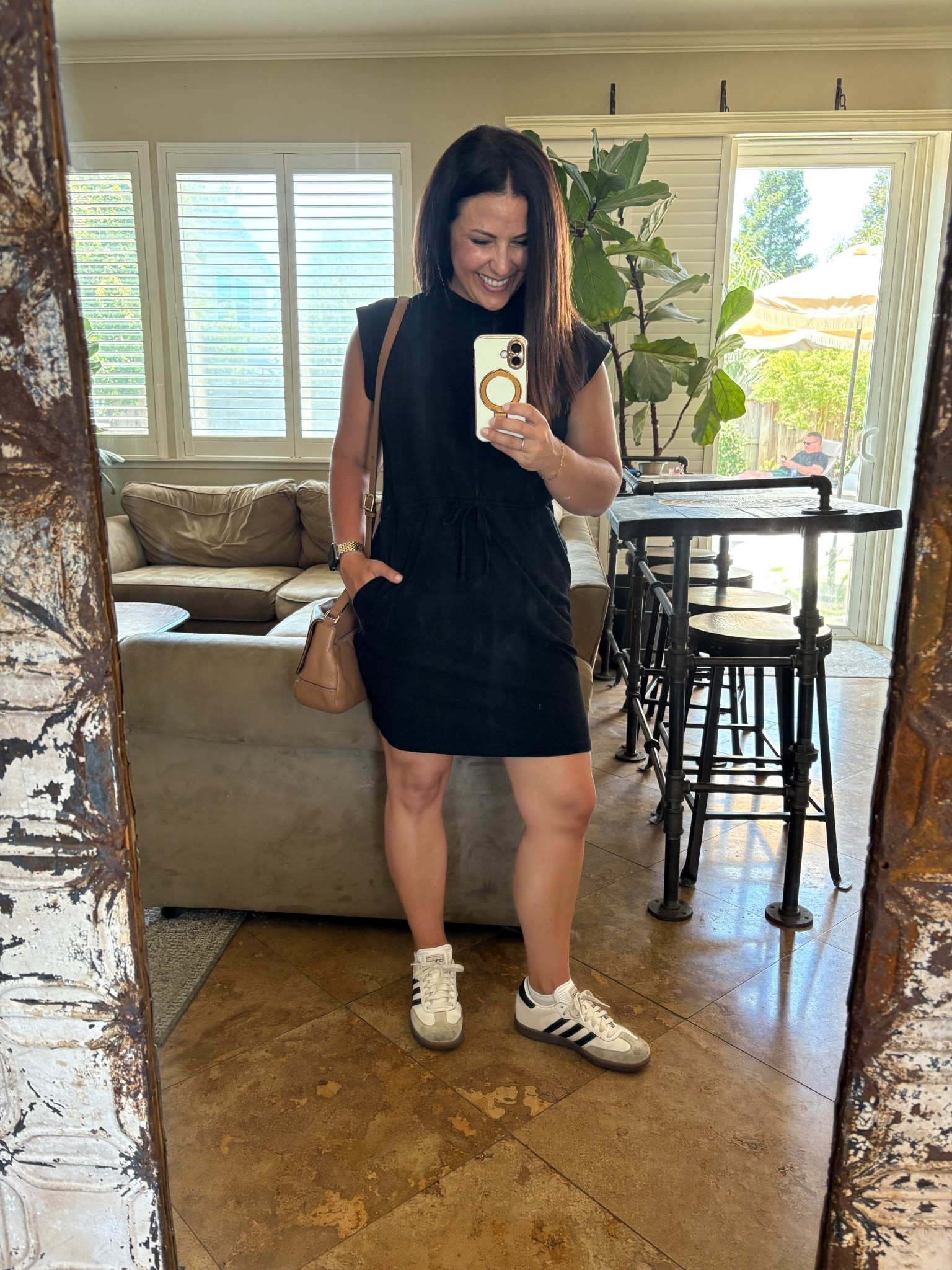 Sporty little black dress with my Sambas. This dress can be worn so many ways, dressed up or down. Perfect for travel, golf, pickleball, date night or office wear. I’m wearing a small. 

#LTKOver40 #LTKSummerEdit #LTKTravel