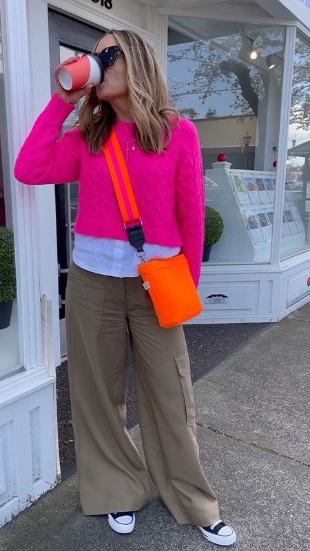 Check it out💗🧡 You’ll definitely see me coming in this hot pink sweater & @quiltedkoala neon bag! Spring’s got me grabbing for everything bright & colorful—I say go big or go home!! Who’s with me?😄💗
•
This sweater has been one of my favorite spring buys—it’s still chilly here and the fun color + the peek of white hit just the right seasonal note! On major sale too!🌸 Loving how it coordinates with the pink & orange strap of my neon bag!🧡 Also comes in more fun colors—shop my entire look on the @shop.LTK app & shop my utility wide leg pants on GSTQ.com!

Anthropologie, quilted koala, neon bag, pink sweater, spring sweater, spring outfit, wide leg cargo pants, converse sneakers, workwear, office outfit 

#LTKSeasonal #LTKsalealert #LTKunder100